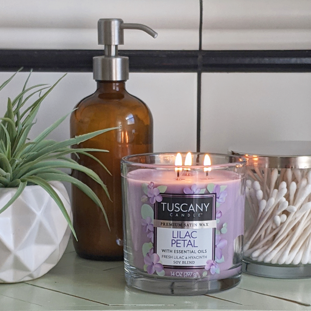 Tuscany Candle Lilac Petal Long-Lasting Scented Jar Candle (14 oz) with a hint of lilac fragrance.