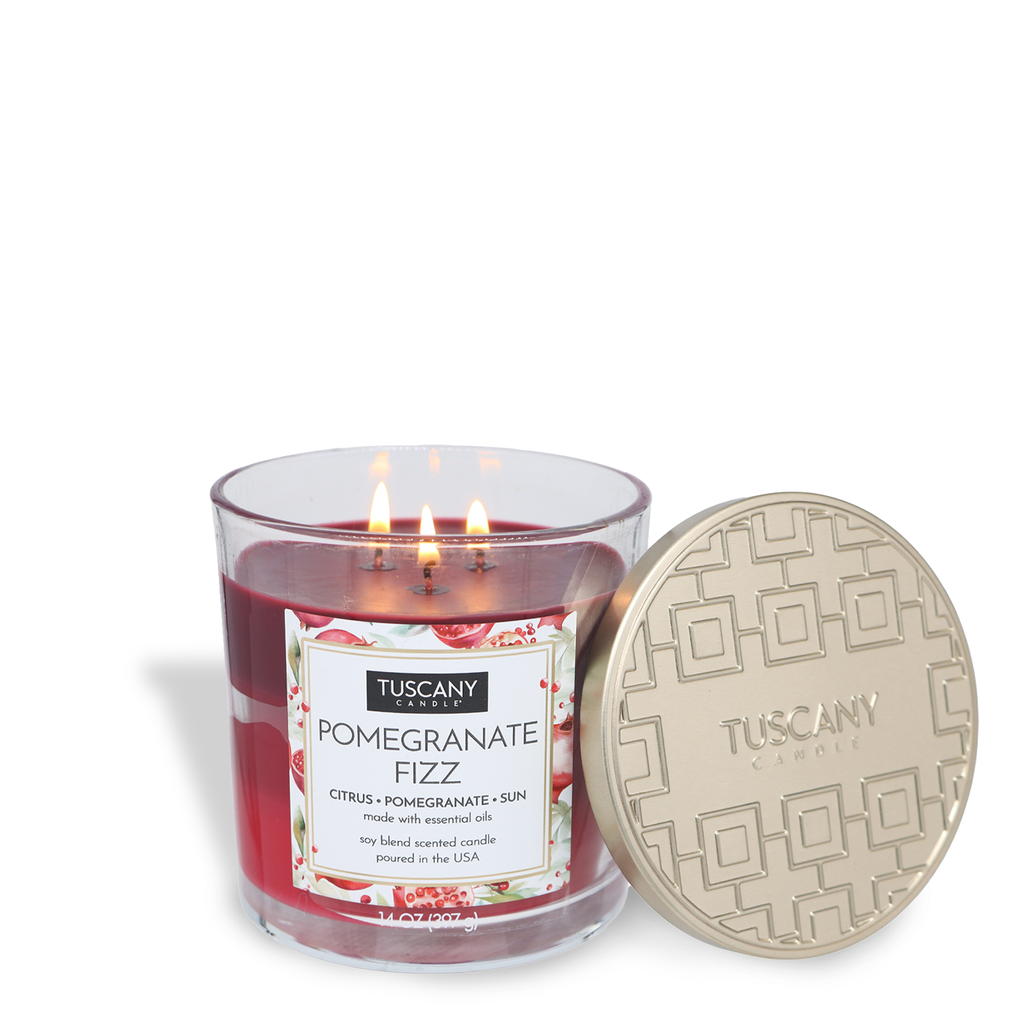 A lit Tuscany Candle® EVD Pomegranate Fizz Long-Lasting Scented Jar Candle (14 oz) rests beside its decorative gold lid.