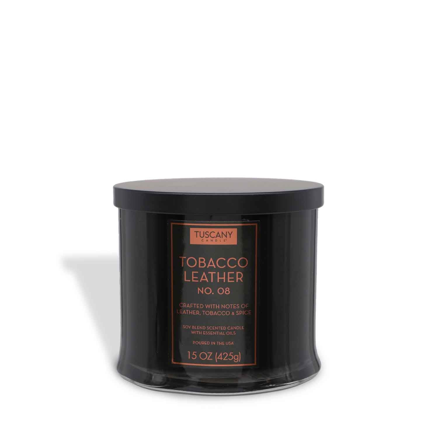 The Tuscany Candle® EVD Tobacco Leather Scented Jar Candle (15 oz) from the Homme + Heritage Collection features a masculine blend of vintage leather, tobacco, and spice in a sleek black jar.
