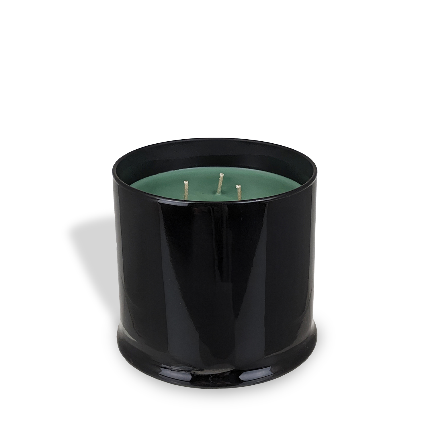 The Tuscany Candle® EVD Mountain Thistle Scented Jar Candle (15 oz) from the Homme + Heritage Collection features green wax in a black glass jar with three unlit wicks, inspired by mountain thistle and fir needle, shown on a white background.