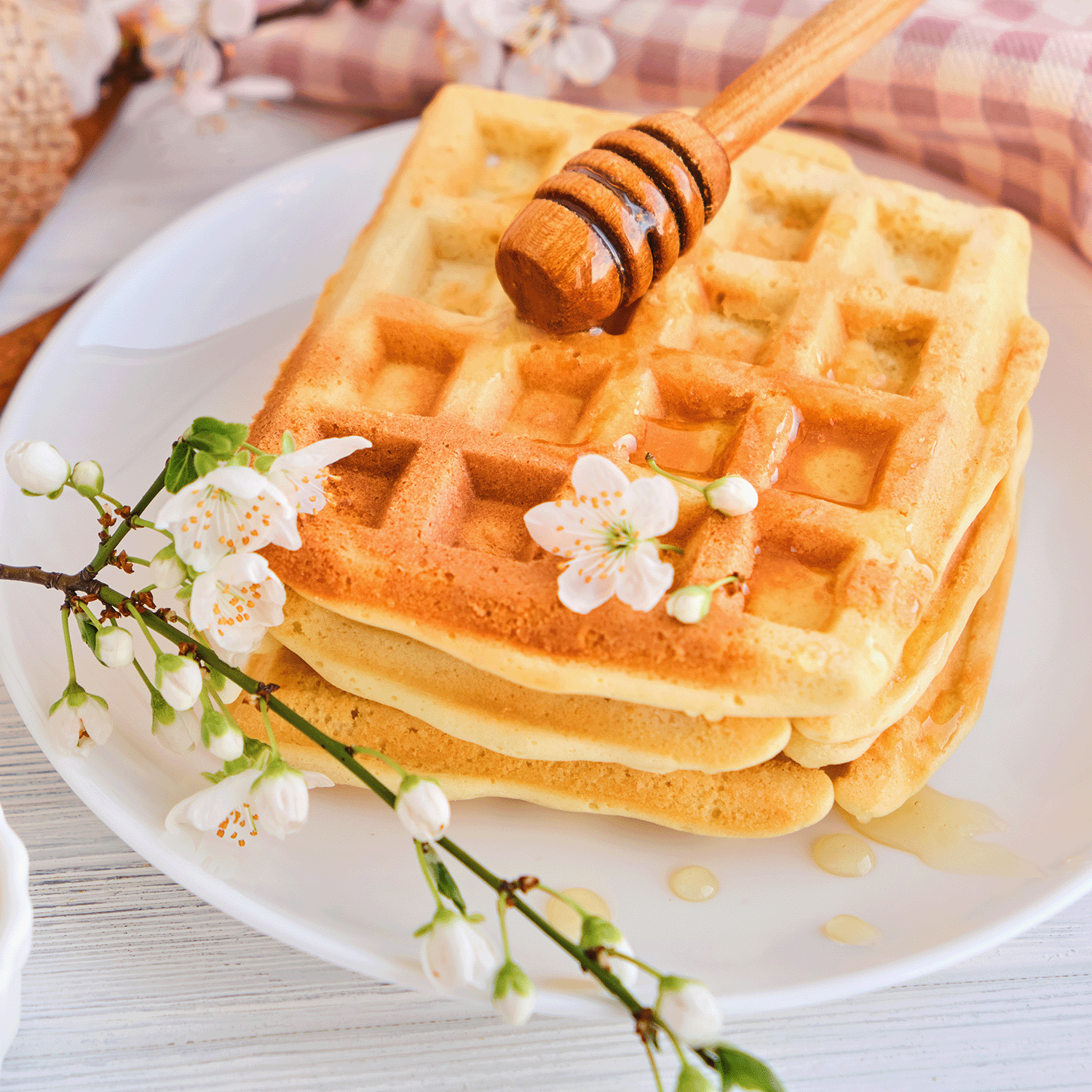 The Blueberry Bunny: Waffle Scented Easter Candle by Tuscany Candle® SEASONAL evokes the aroma of blueberry waffles drizzled with honey, complemented by a touch of spring fragrance from white flowers.