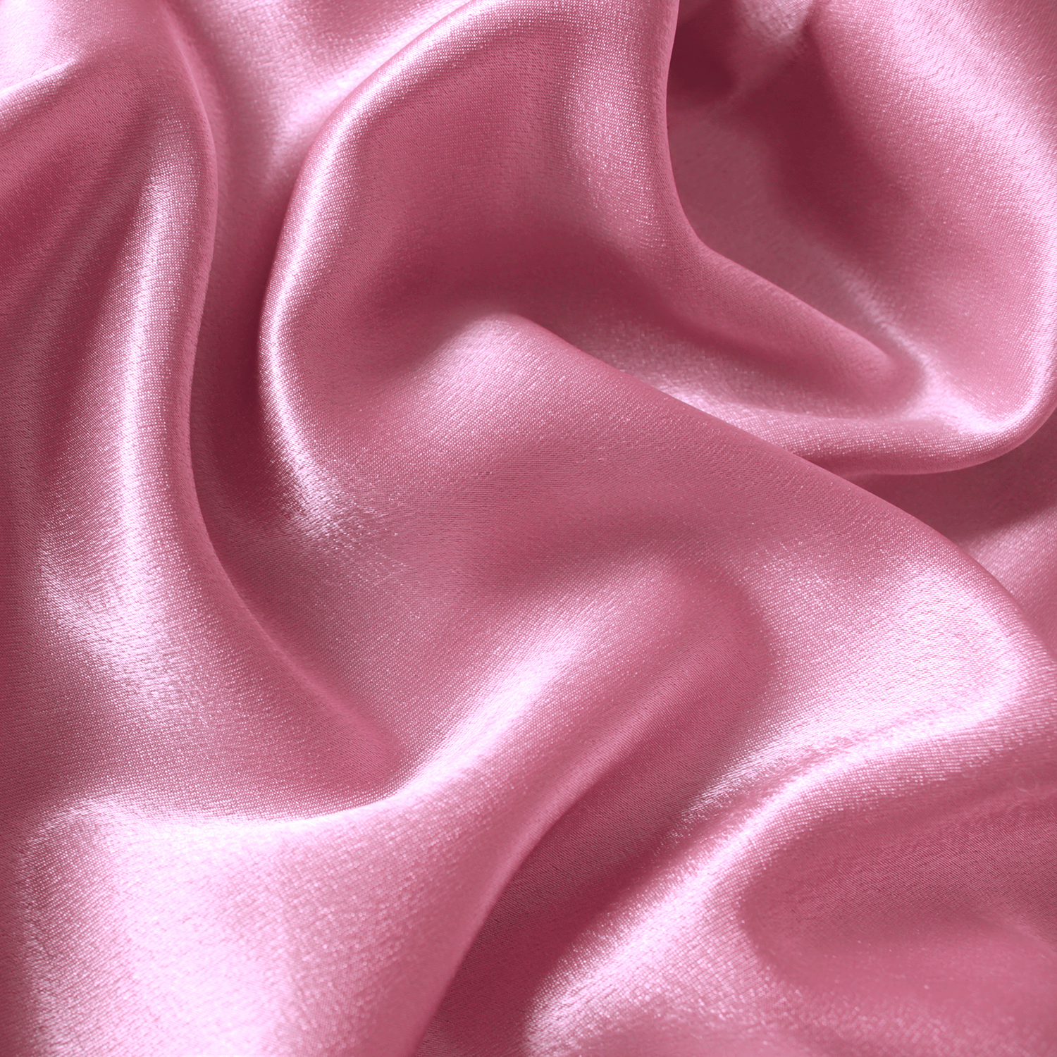 Close-up of Tuscany Candle® SEASONAL Silky Satin: Cotton & Chamomile Scented Valentine's Candle (14 oz) with a smooth, pink satin design and a shiny, reflective finish.