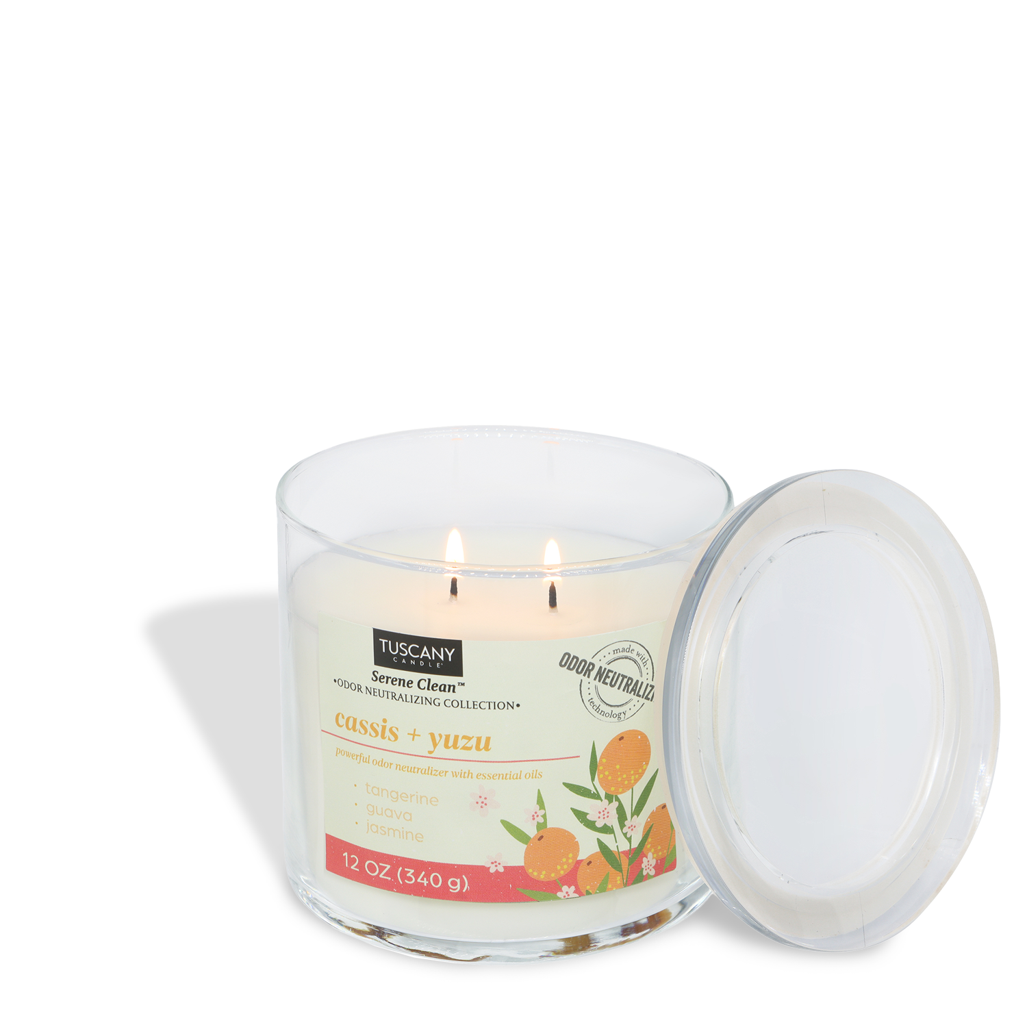 The Tuscany Candle® Everyday Cassis + Yuzu Scented Odor Neutralizing Candle (12 oz) from the Serene Clean Collection features two wicks, a glass jar, and fresh notes of tangerine, guava, and jasmine. The lid rests beside the candle.