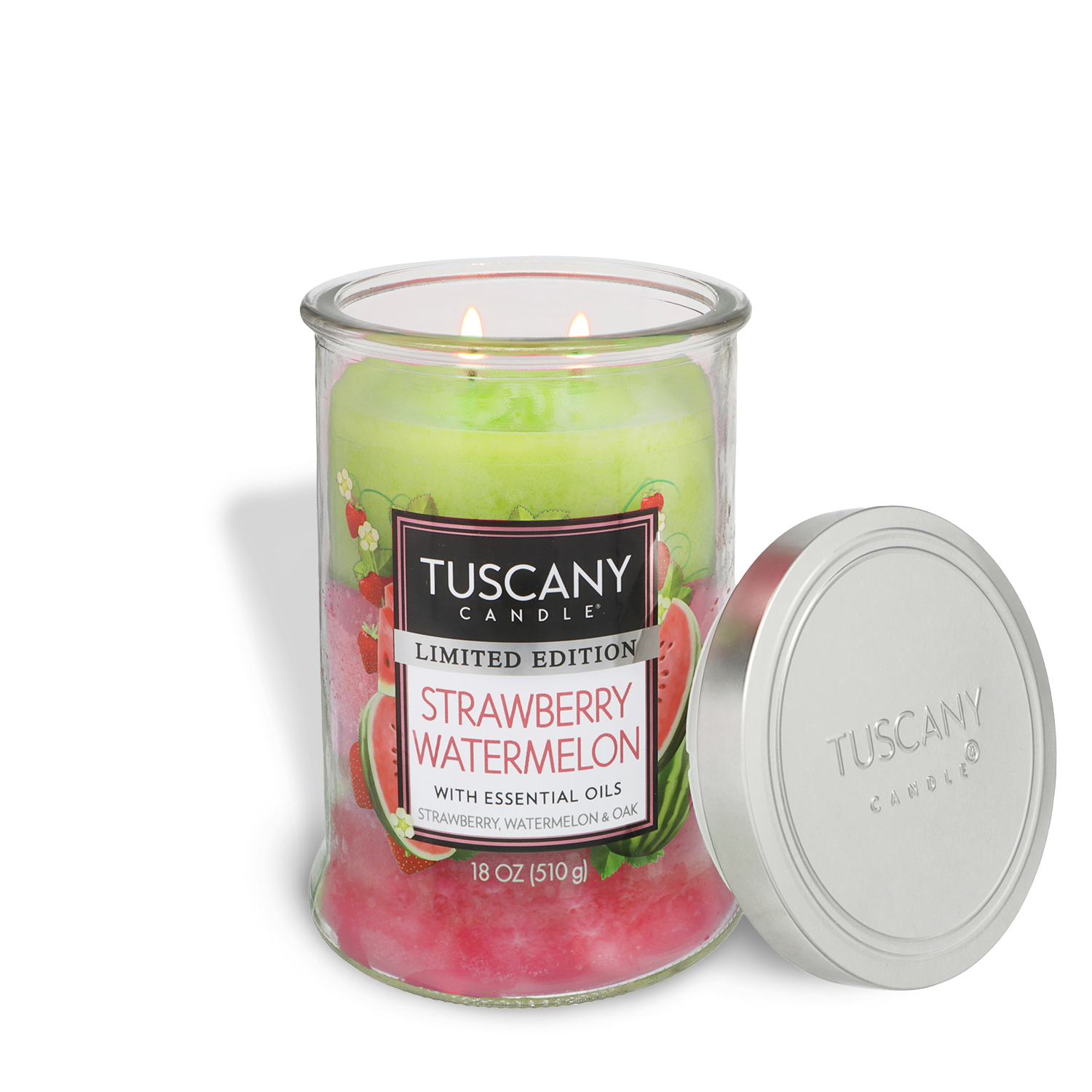 The Tuscany Candle® SEASONAL Strawberry Watermelon: Fruit Blend & Oak Scented Spring Candle (18 oz) features pink and green wax in a glass jar with essential oils; its silver lid is off, resting nearby.
