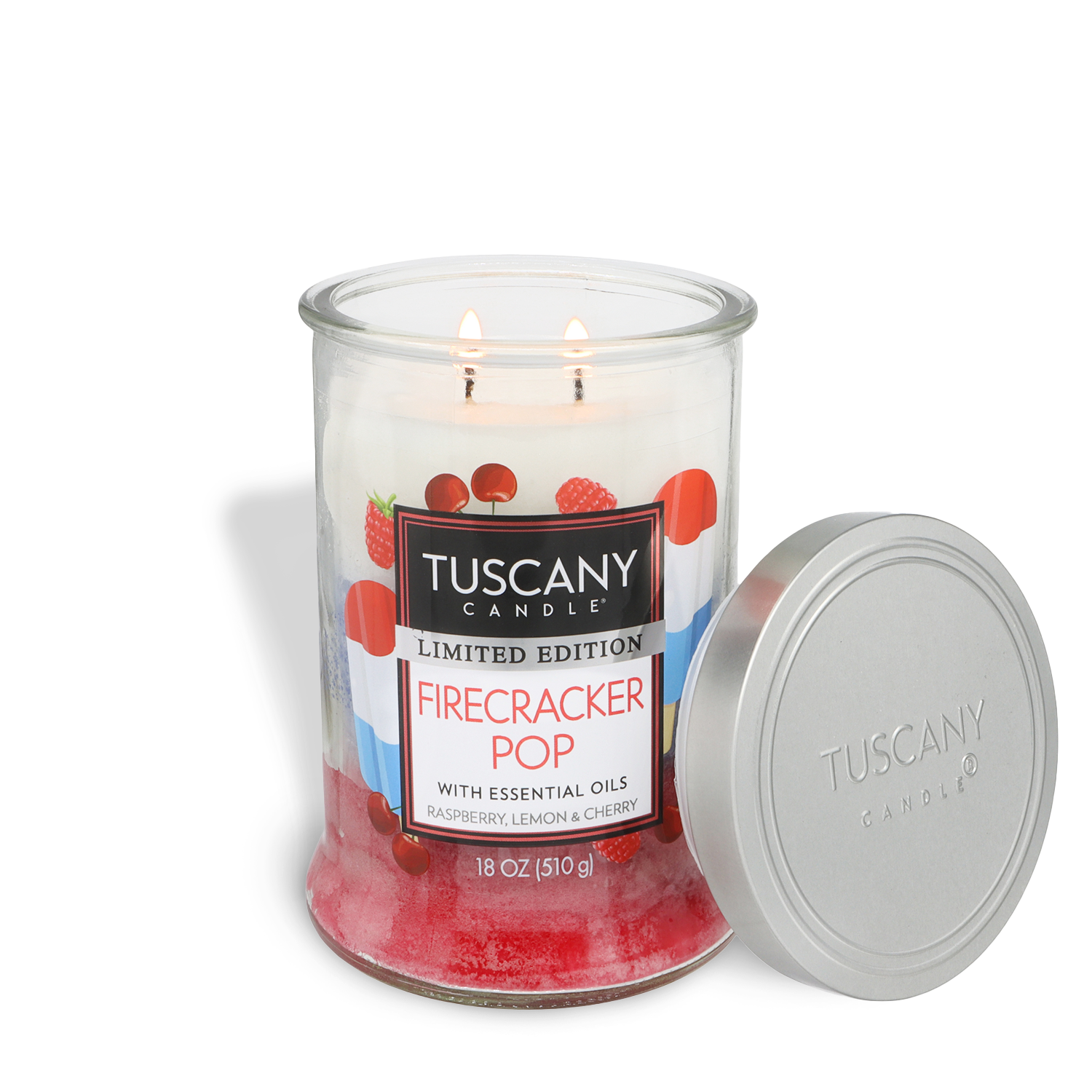 An 18 oz Tuscany Candle® SEASONAL Firecracker Pop: Raspberry, Lemon & Cherry Scented Summer Candle with two wicks is shown in a glass jar, its lid off and placed beside it.