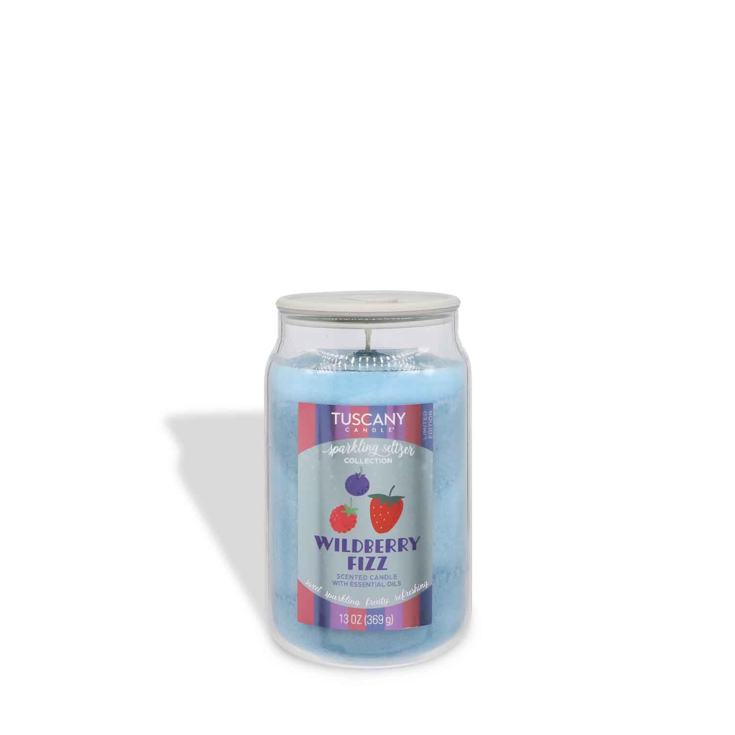 A 13 oz Tuscany Candle® SEASONAL "Wildberry Fizz: Sparkling Seltzer Scented Summer Candle" in a glass jar, part of the Sparkling Sugar Collection, features fruit graphics on the front.
