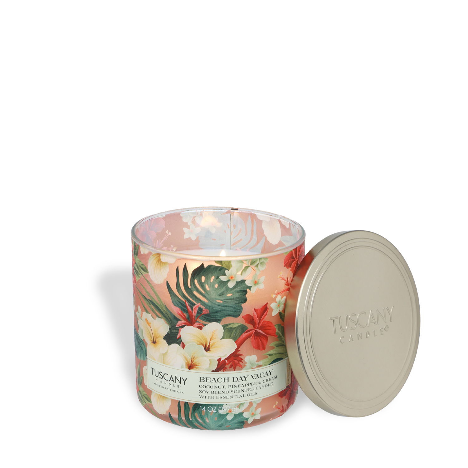 The Tuscany Candle® SEASONAL "Beach Day Vacay" Coconut & Citrus Scented Spring Candle (14 oz) from the Dreamy Destinations Collection features a tropical floral jar with a silver lid, bringing vacation vibes to any room.