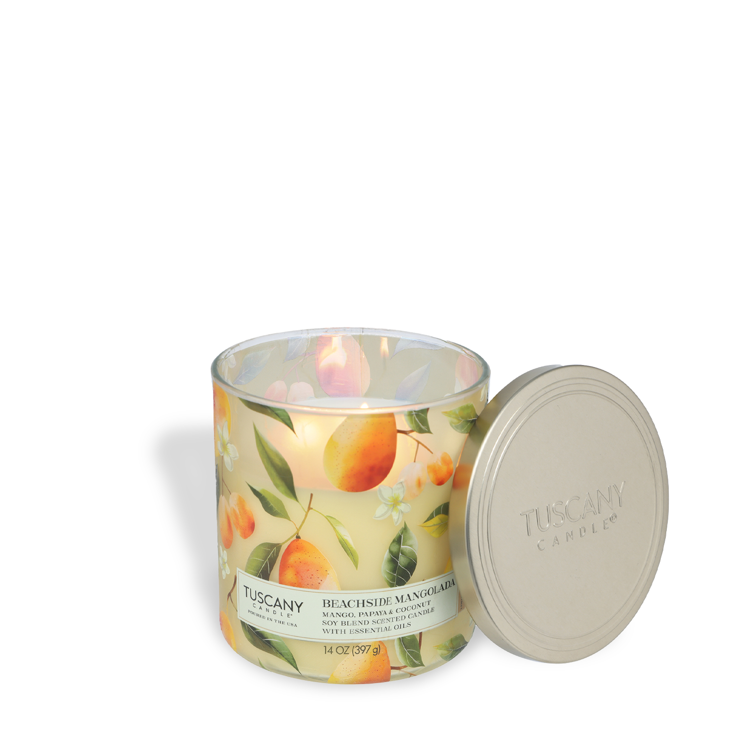 A lit Tuscany Candle® SEASONAL Beachside Mangolada: Papaya & Mango Scented Spring Candle (14 oz) from the Dreamy Destinations Collection fills the air with tropical notes as its jar lid rests nearby.
