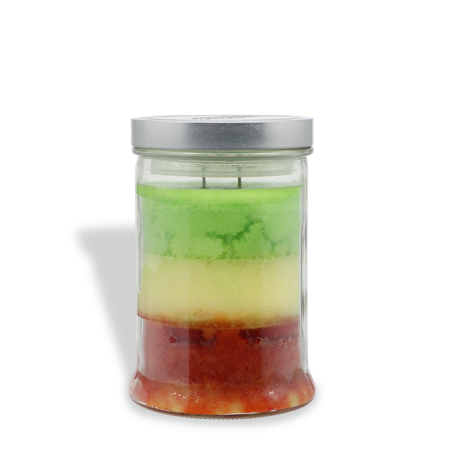A Tuscany Candle® SEASONAL Mystic Apples: Caramel & Poison Apples Scented Halloween Candle (18 oz) in a glass jar features three colored layers—green on top, yellow in the middle, and red on the bottom—and comes with a silver metal lid.