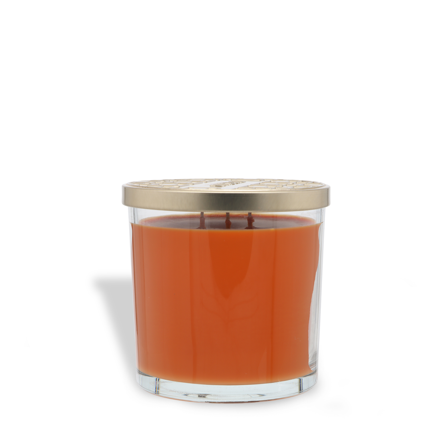 A 14 oz glass jar candle from Tuscany Candle® SEASONAL, the Hallowed Pumpkin: Pumpkin & Leather Scented Halloween Candle features orange wax, three visible wicks, and is topped with a metallic lid.