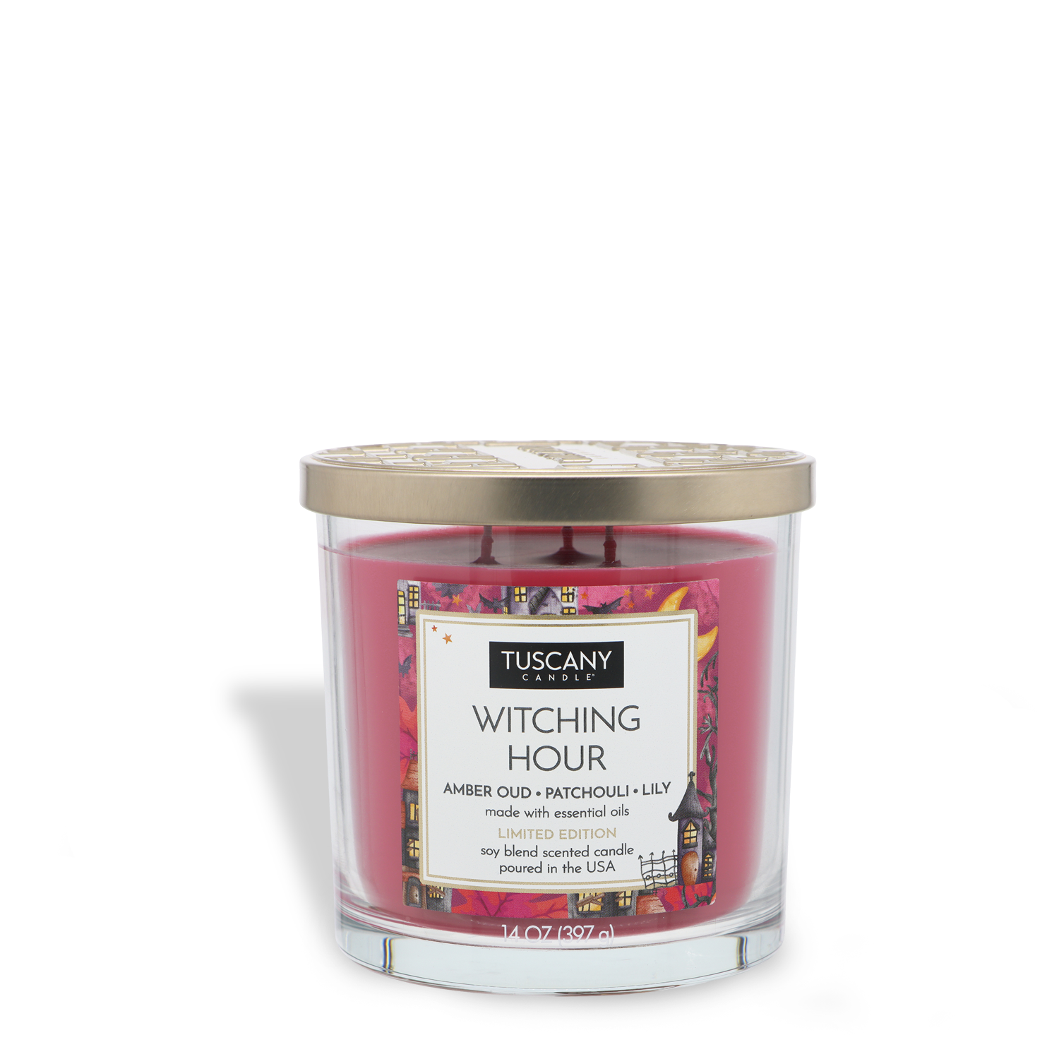 A clear glass candle labeled “Witching Hour: Patchouli & Oud Scented Halloween Candle (14 oz)” from Tuscany Candle® SEASONAL, featuring a gold lid, pink wax, and scented with amber oud, patchouli, and lily.