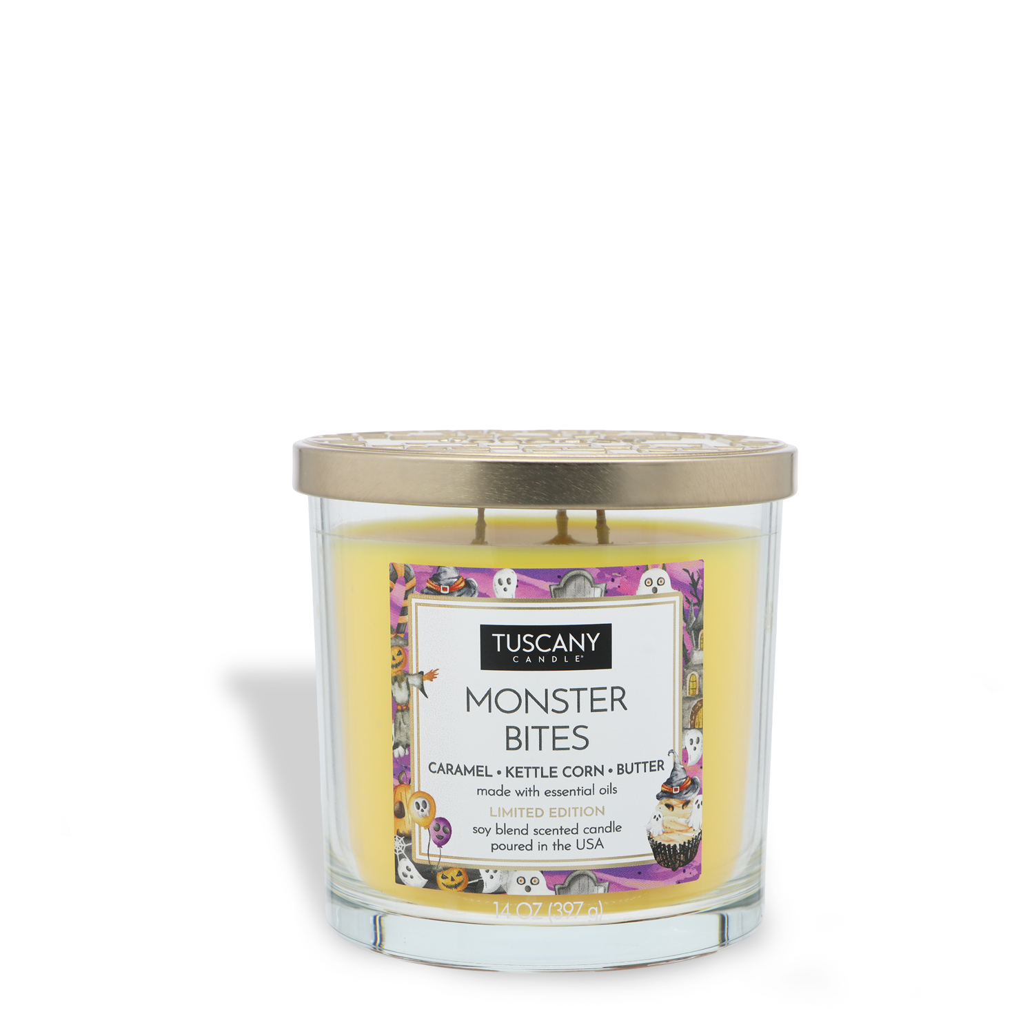 A 14 oz Tuscany Candle® SEASONAL “Monster Bites: Caramel Kettlecorn Scented Halloween Candle” in yellow, featuring a clear glass jar with a gold lid and an illustrated label.