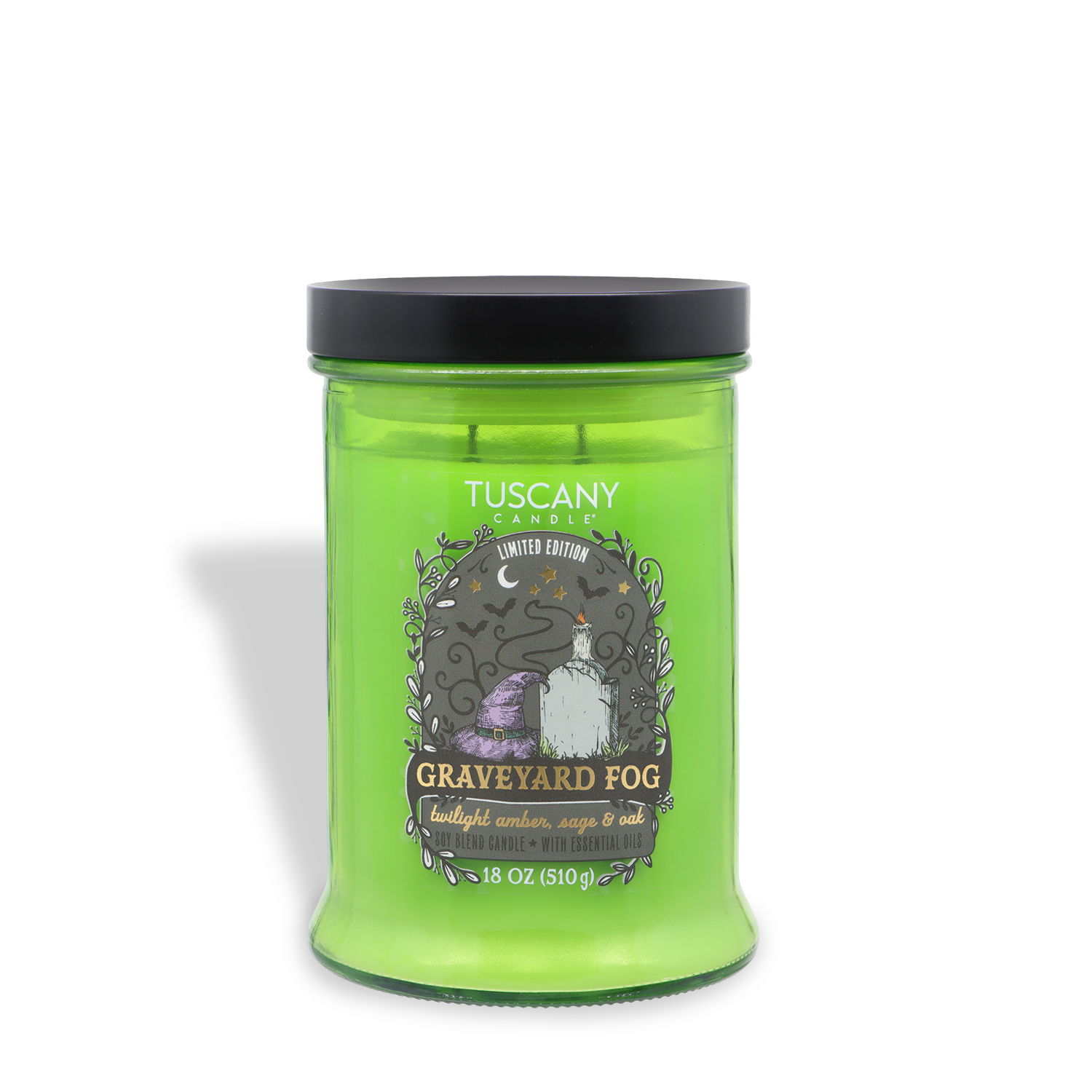 A green Tuscany Candle® SEASONAL jar labeled “Graveyard Fog: Twilight Amber, Sage & Oak Scented Halloween Candle (18 oz)” with illustrations of a tombstone and moon, featuring a black lid.
