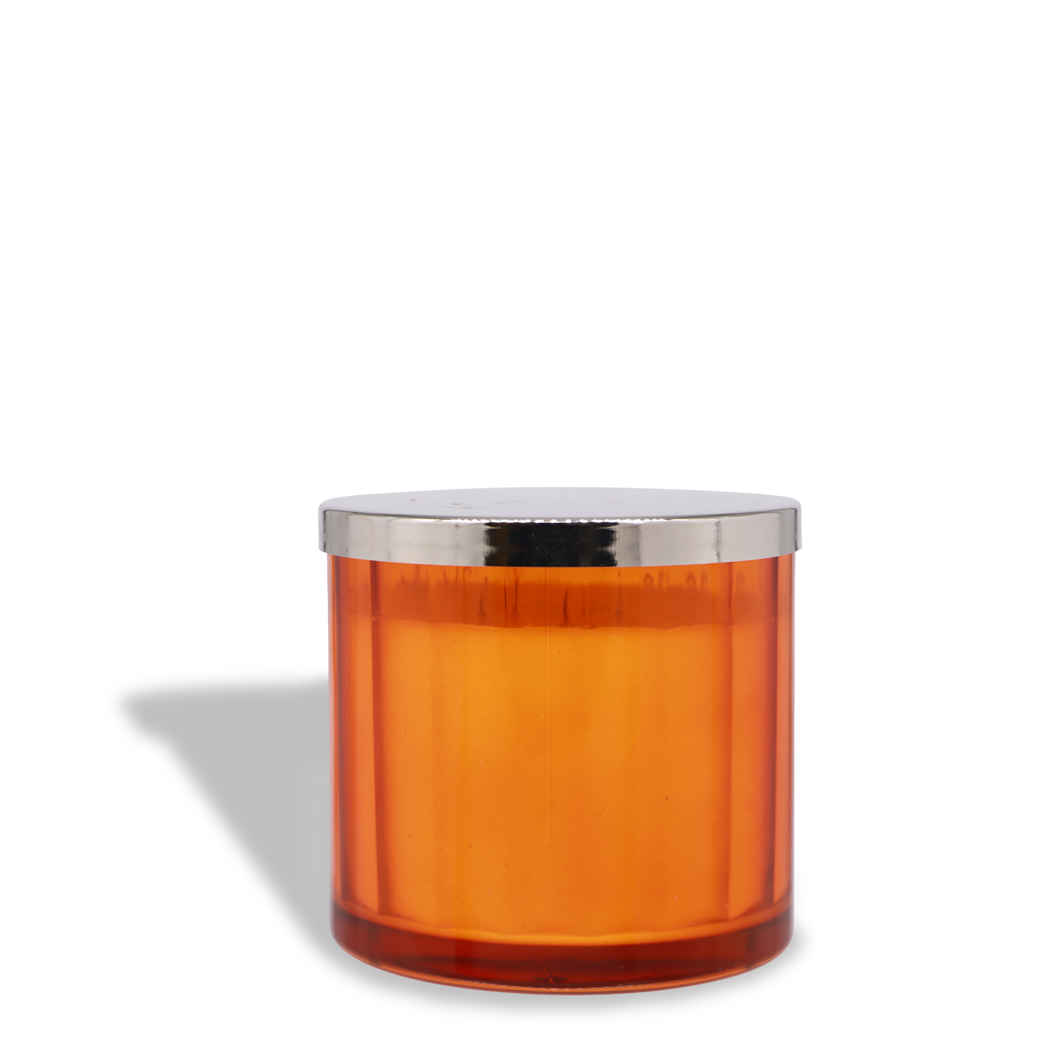 A Pumpkin Party: Clove & Tonka Scented Halloween Candle (12.5 oz) by Tuscany Candle® SEASONAL, housed in an orange cylindrical container with a silver lid, casts a shadow to the left on a white background.