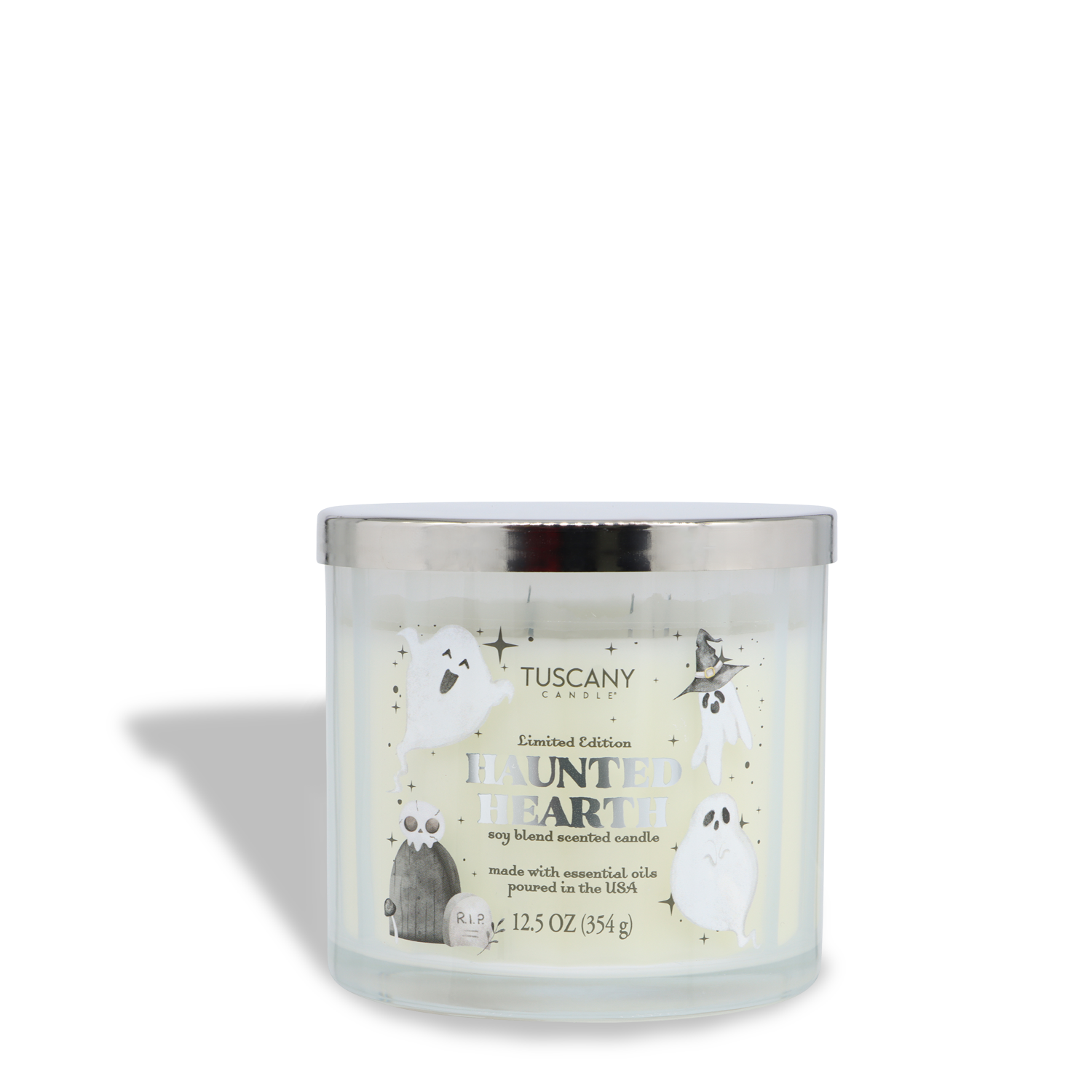 A 12.5 oz white Tuscany Candle® SEASONAL jar labeled “Haunted Hearth: Apple & Citrus Zest” featuring cartoon ghosts and a silver lid; this limited edition, soy blend Halloween candle is made in the USA.