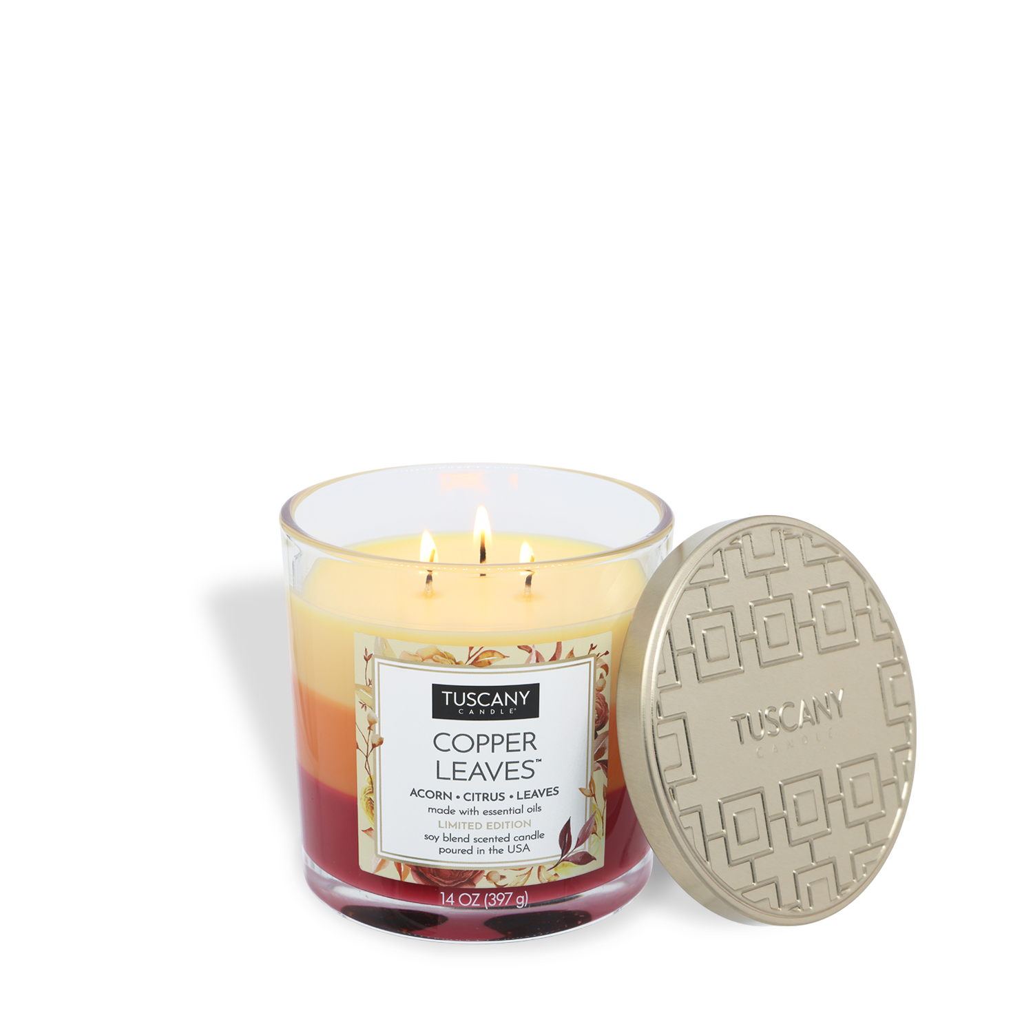 A Tuscany Candle® SEASONAL Copper Leaves®: Acorns & Crushed Leaves Scented Fall Candle (14 oz) features triple wicks, a beautiful yellow-to-red gradient soy blend wax, and comes with a decorative gold lid placed beside it—making this autumn home fragrance the perfect way to warm up your space.