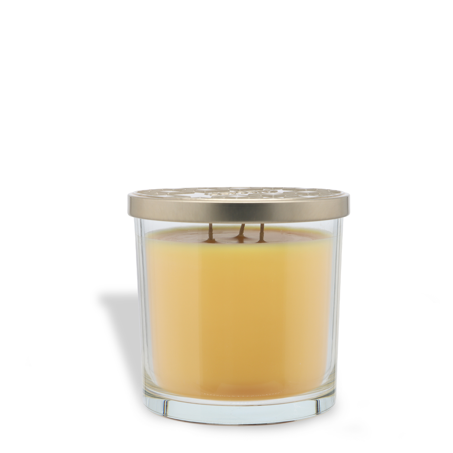 The Glazed Croissant: Butter & Pistachio Scented Fall Candle by Tuscany Candle® SEASONAL is a yellow 14 oz three-wick candle in a clear glass jar with a metallic lid, shown on a white background.