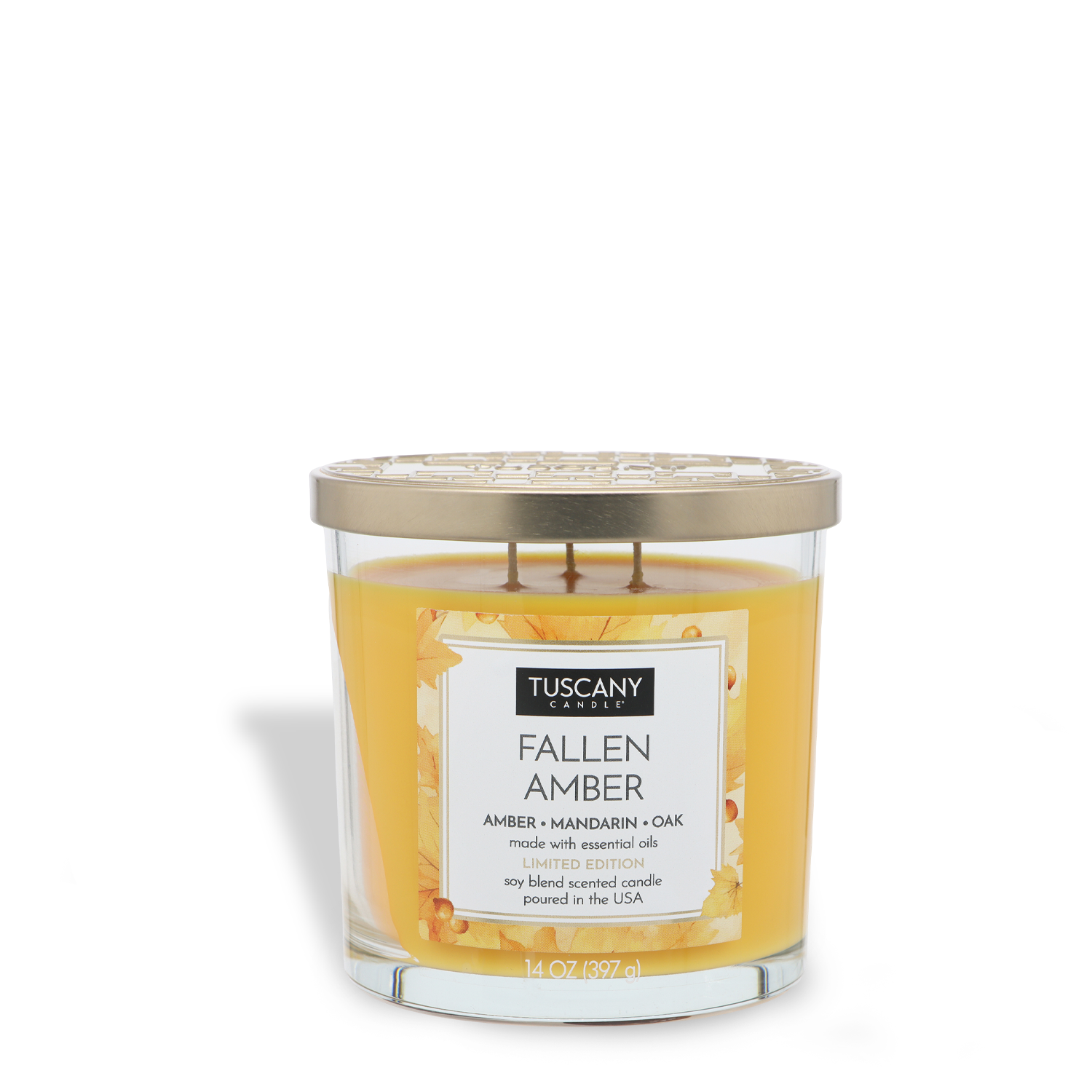 A yellow Tuscany Candle® SEASONAL "Fallen Amber: Mandarin & Oak" (14 oz) features a gold lid, amber-colored wax with decorative touches, and scent notes of amber, mandarin, and oak.