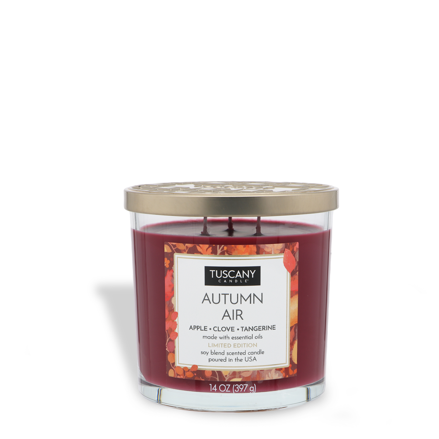 The Tuscany Candle® SEASONAL "Autumn Air: Apple & Clove Scented Fall Candle" (14 oz) comes in a clear glass jar with gold lid and an autumn-themed label, featuring apple, clove, and tangerine scents.