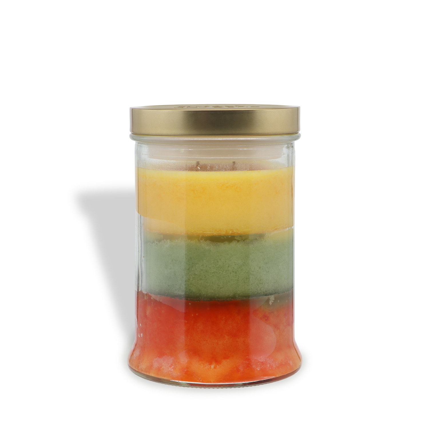 An 18 oz Copper Leaves®: Acorns & Crushed Leaves Scented Fall Candle by Tuscany Candle® SEASONAL, displayed in a glass jar with a gold lid, features vibrant red, green, yellow, and cream marbled wax layers against a white background.