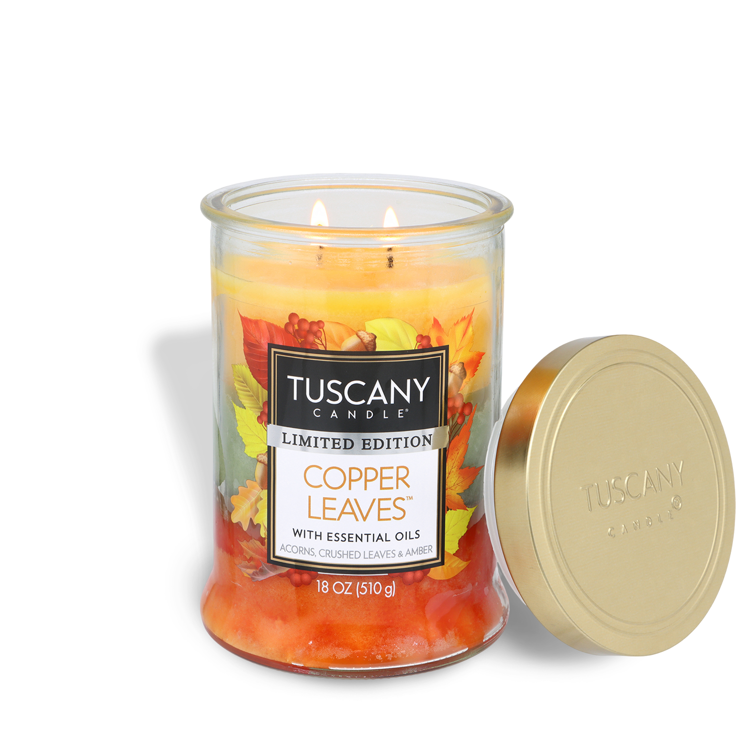 Tuscany Candle® SEASONAL Copper Leaves®: Acorns & Crushed Leaves Scented Fall Candle (18 oz) features premium marbled wax in a glass jar with a gold lid, adorned with a fall-themed label and two lit wicks. This autumn candle fills your space with an inviting seasonal fragrance.