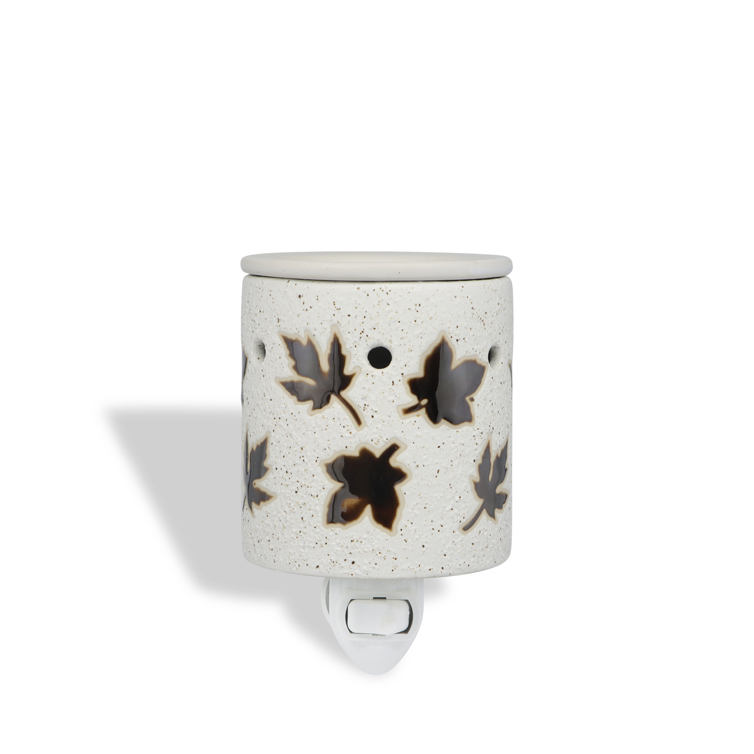 The Tuscany Candle® SEASONAL Autumn Leaf Wax Melt Warmer, a ceramic outlet warmer with leaf cutout designs, is displayed against a white background.