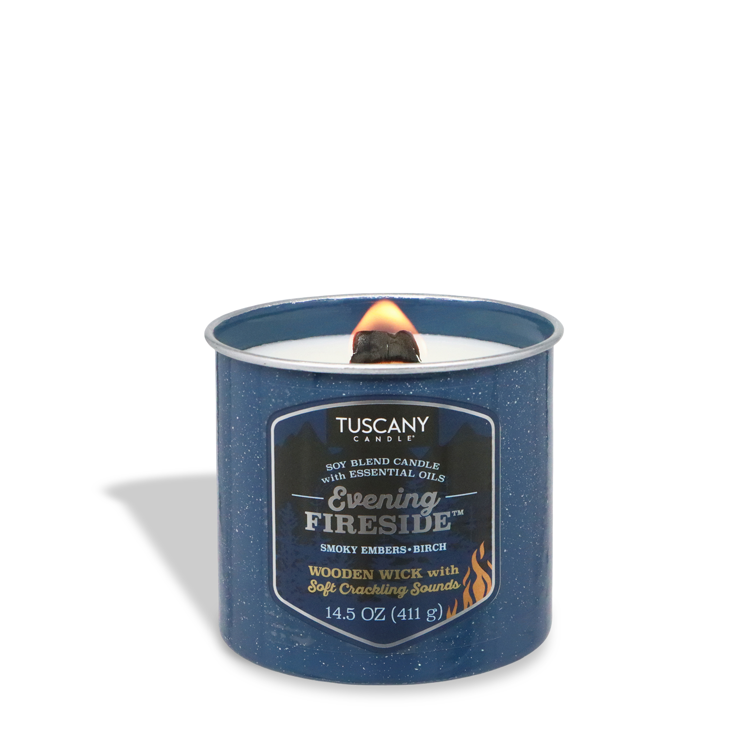A lit Tuscany Candle® SEASONAL "Evening Fireside®: Smoky Embers & Birch" Fall Wooden Wick Candle (14.5 oz) glows above white wax, releasing cozy birchwood and smoky ember notes into the air.