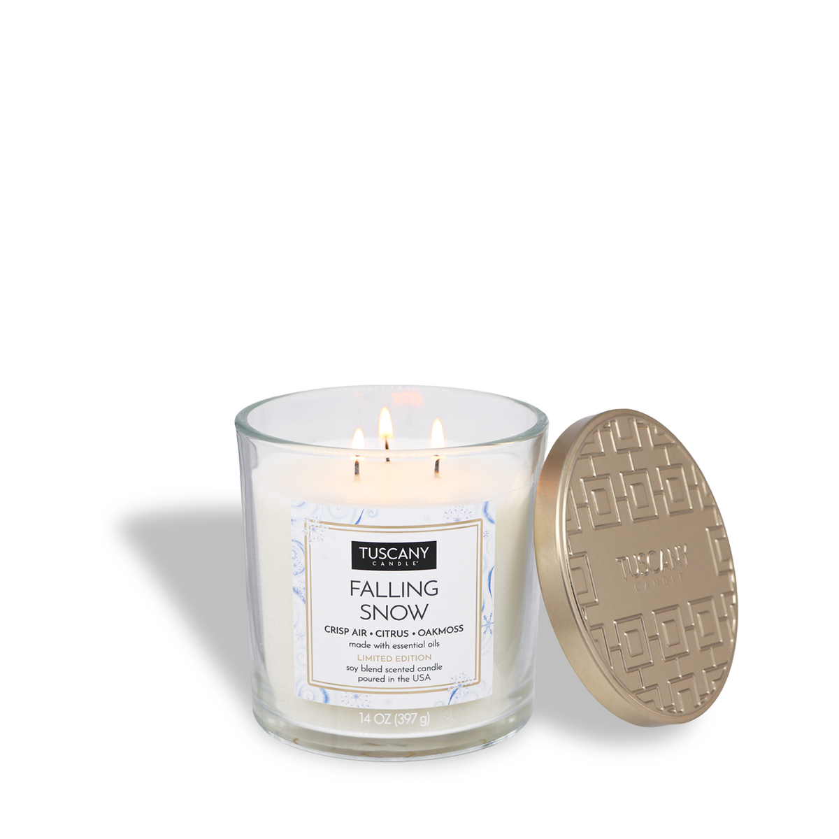 A Tuscany Candle® SEASONAL Falling Snow: Crisp Air & Citrus Scented Holiday Candle (14 oz) featuring three wicks in a glass jar with the lid leaning against it.