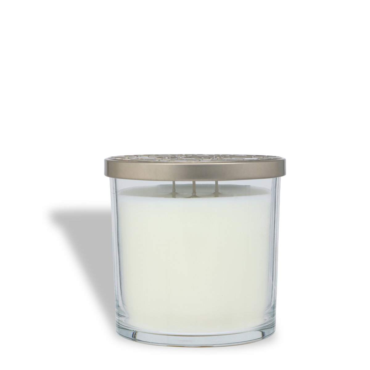 Tuscany Candle® SEASONAL Falling Snow: Crisp Air & Citrus Scented Holiday Candle (14 oz) in a clear glass jar with three wicks and a decorative metal lid.