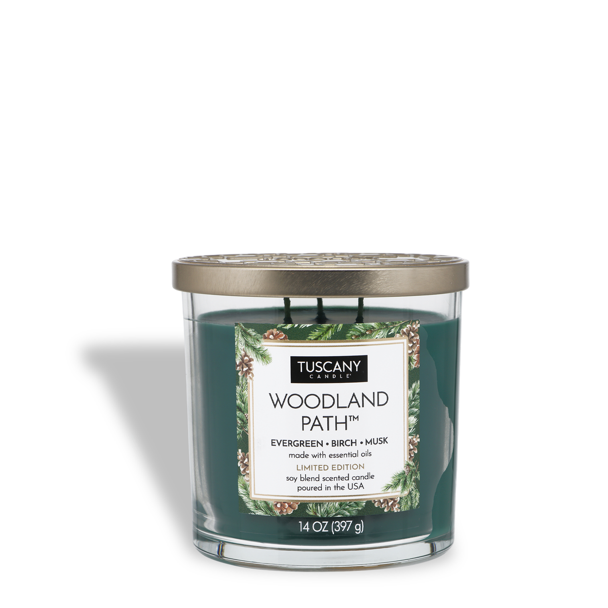 A 14 oz Tuscany Candle® SEASONAL Woodland Path®: Evergreen & Birch scented three-wick jar candle with dark green wax, a gold-colored lid, and a label featuring evergreen branch illustrations.