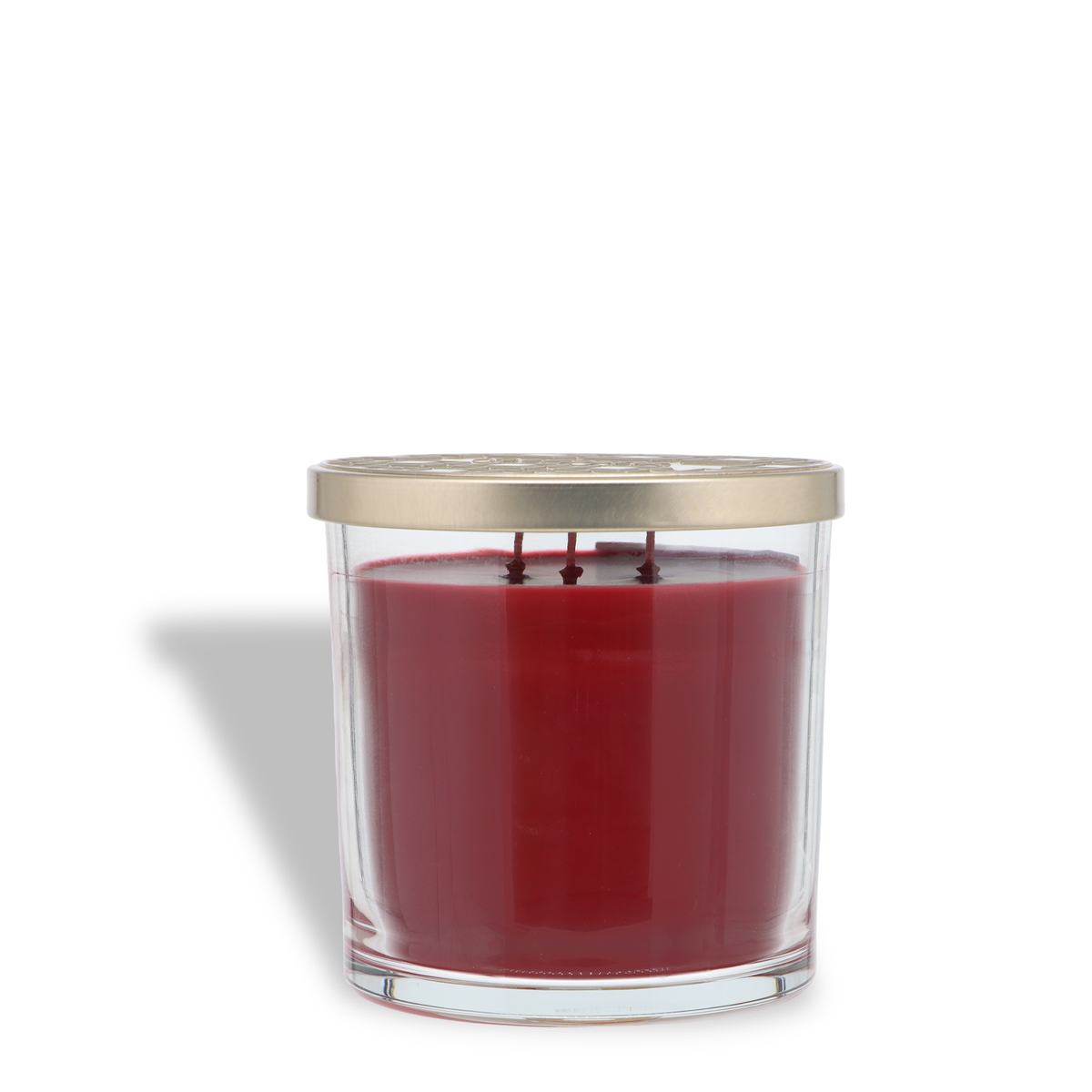 Three-wick red Yuletide Memories: Mulberry & Spice Scented Holiday Candle (14 oz) in a glass jar with a metallic lid.