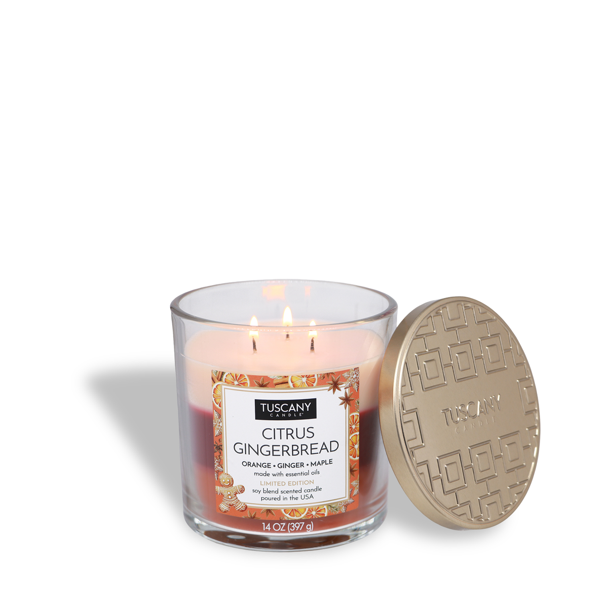 Tuscany Candle® SEASONAL Citrus Gingerbread: Orange & Ginger Scented Holiday Candle (14 oz) three-wick candle in a glass jar next to its gold decorative lid.
