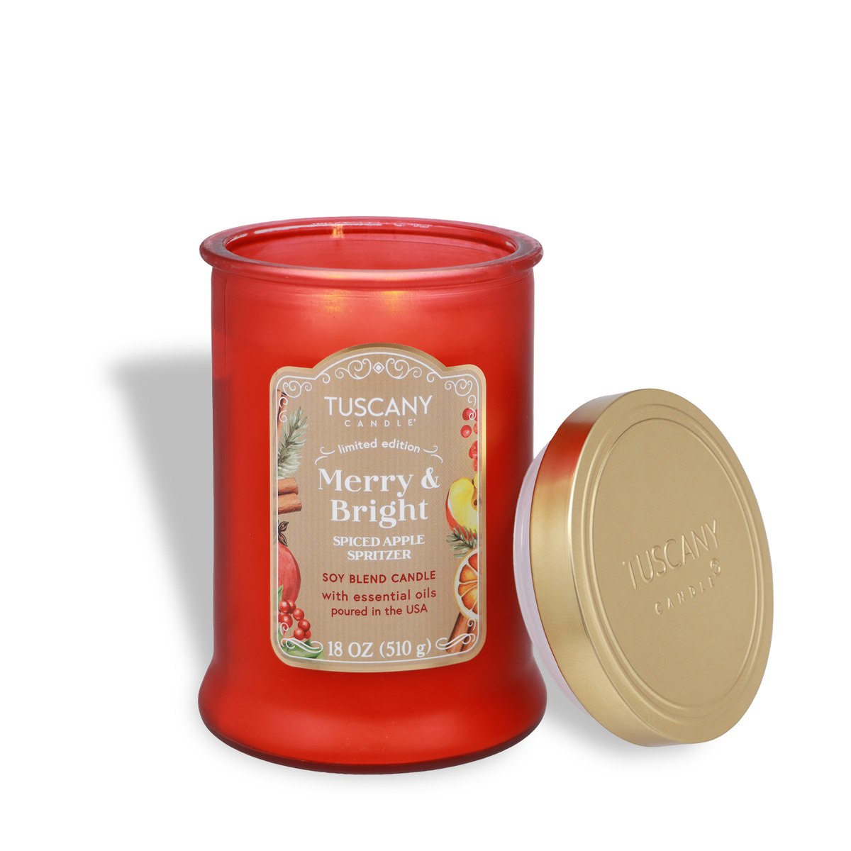 Merry & Bright: Spiced Apple Spritzer Scented Holiday Candle (18 oz) in a red glass jar with a removed gold lid and a label featuring illustrations of apples, cinnamon, and berries.