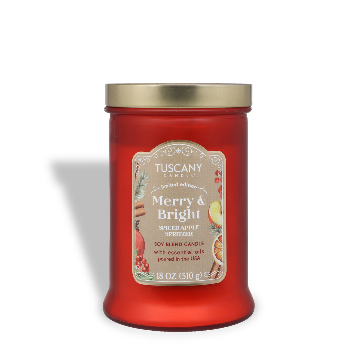 Red glass Merry & Bright: Spiced Apple Spritzer Scented Holiday Candle (18 oz) with a gold lid and a label featuring apples, cinnamon, and berries.