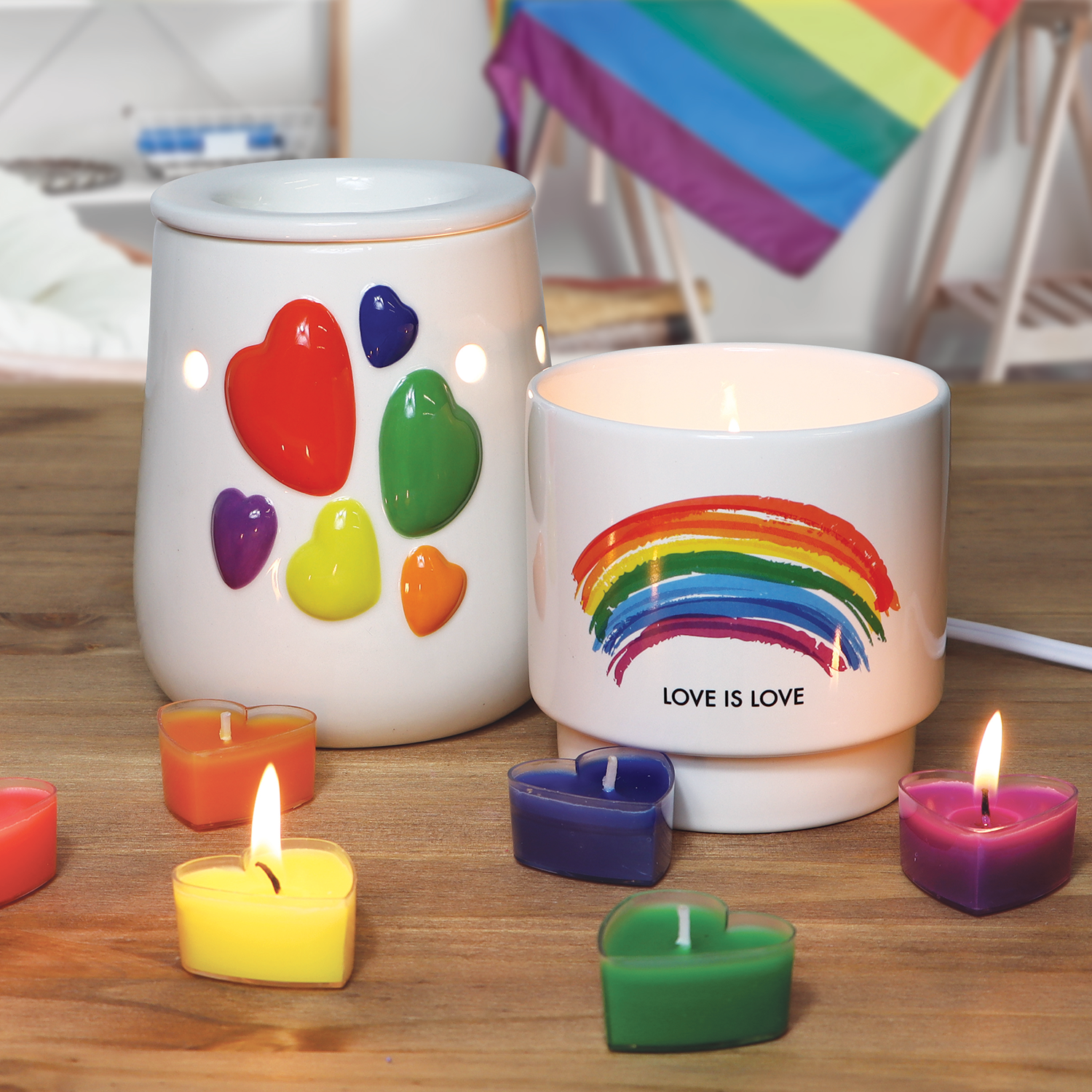 Introducing our new Love is Love Scented Ceramic Candle (10 oz) – Pride Collection candle holder featuring a mesmerizing rainbow candle paired with a delicate heart-shaped lavender candle by Tuscany Candle® SEASONAL.