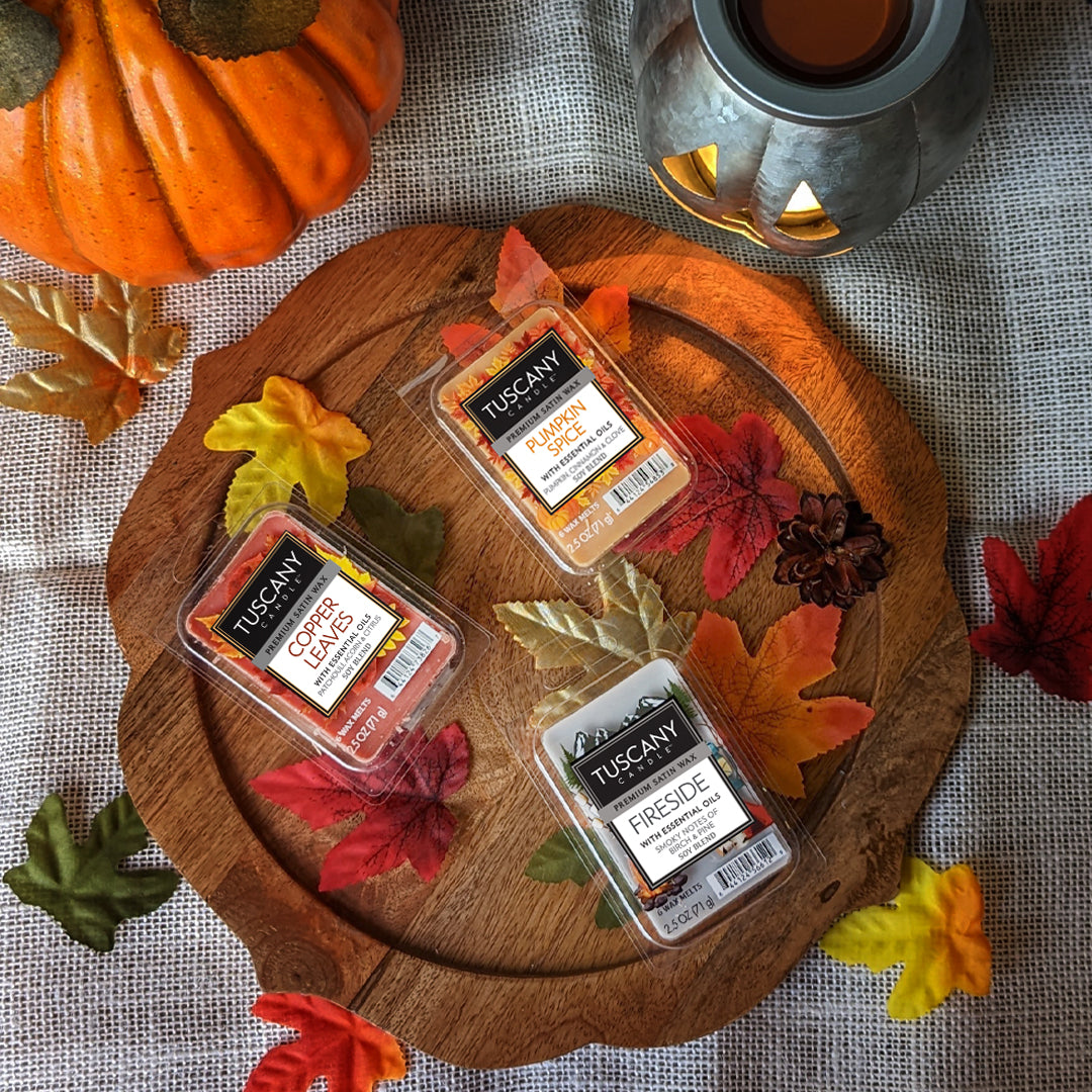 Several fall-fragranced wax snap bars are pictured in their packages