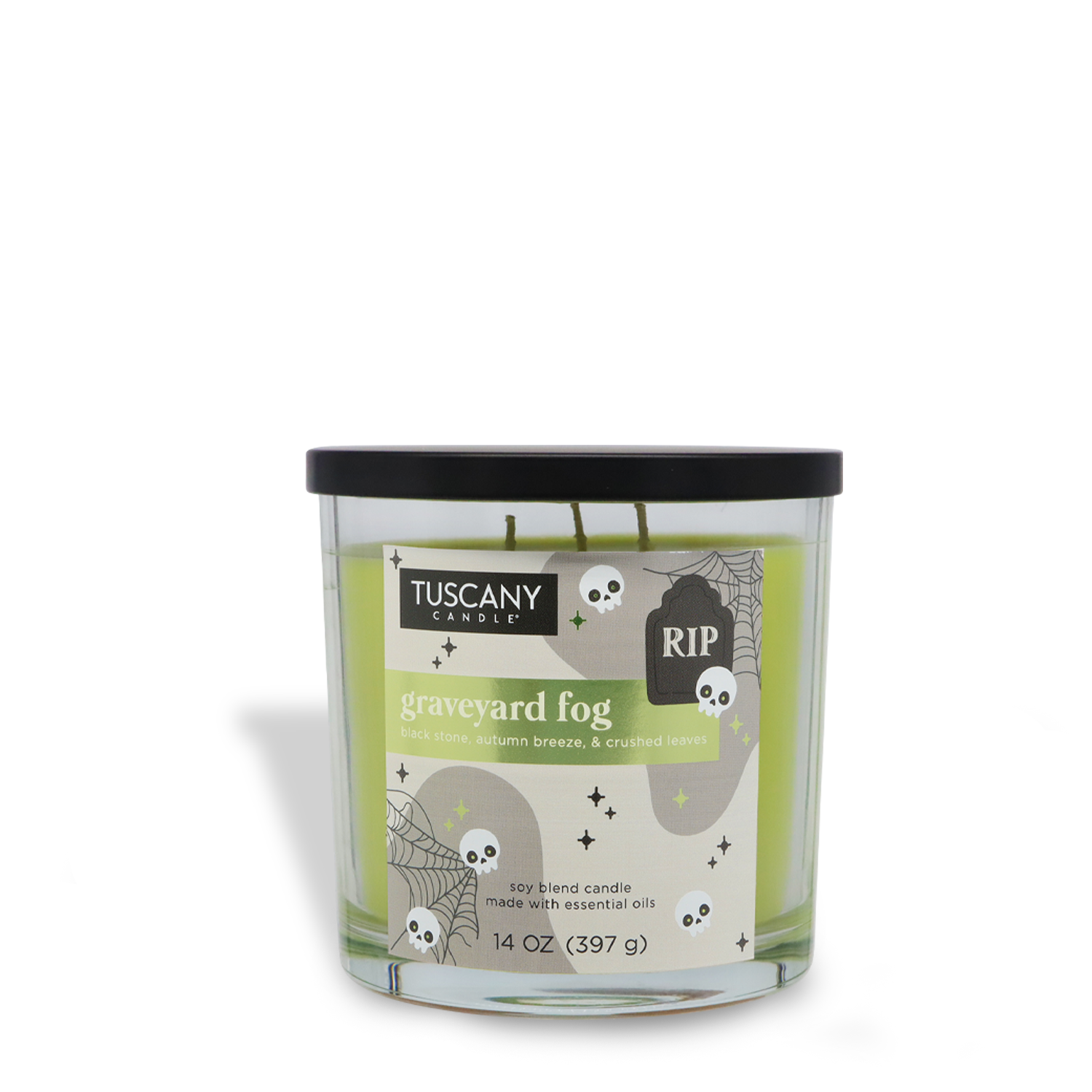 The Tuscany Candle® SEASONAL Graveyard Fog: Crushed Leaves & Autumn Breeze Scented Halloween Candle (14 oz) features a green jar with themed designs and a black lid, made from a soy blend.