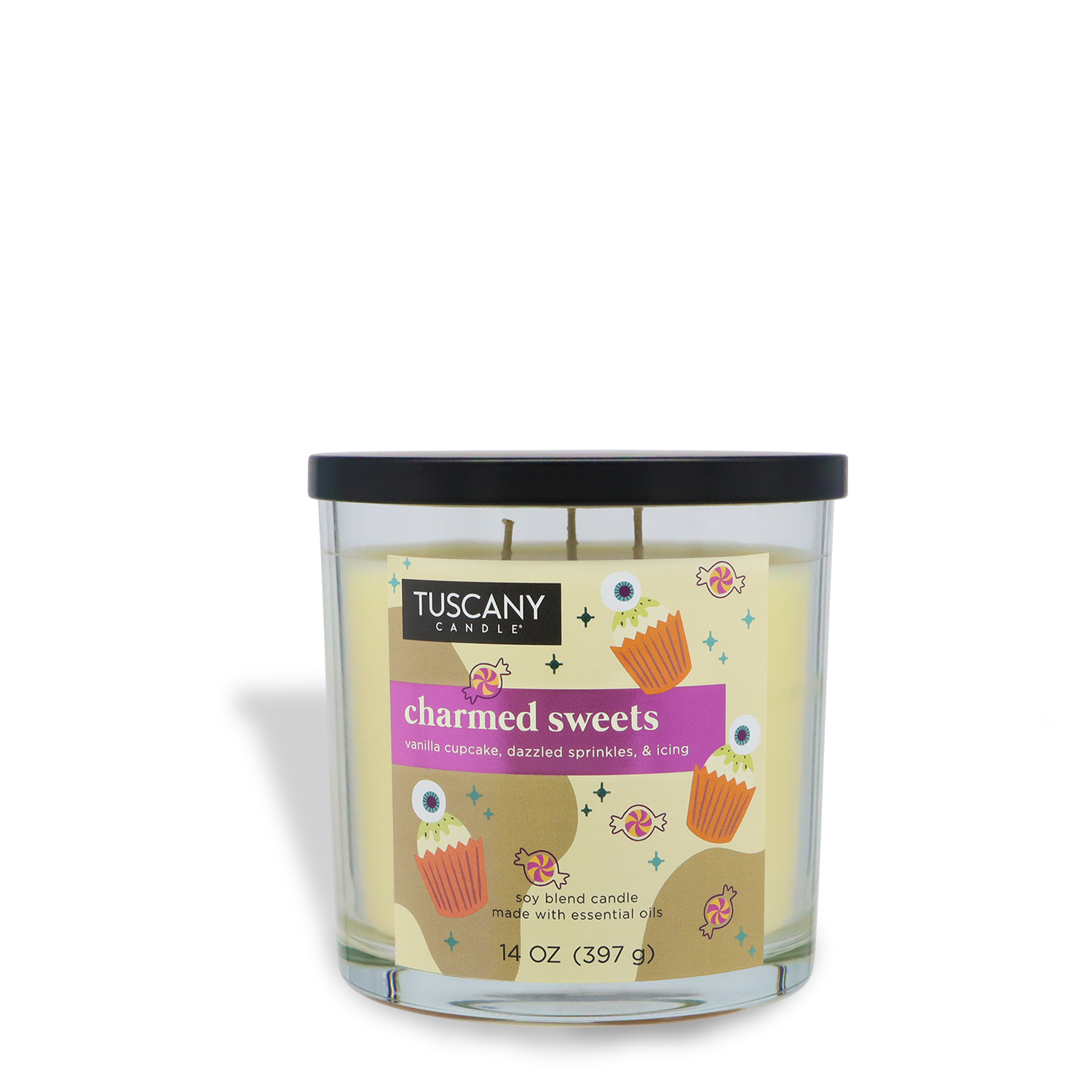 The Tuscany Candle® SEASONAL "Charmed Sweets: Vanilla Cupcake & Buttercream Icing" Halloween Candle (14 oz) comes in a clear glass jar with a black lid and features colorful cupcake illustrations on the label.