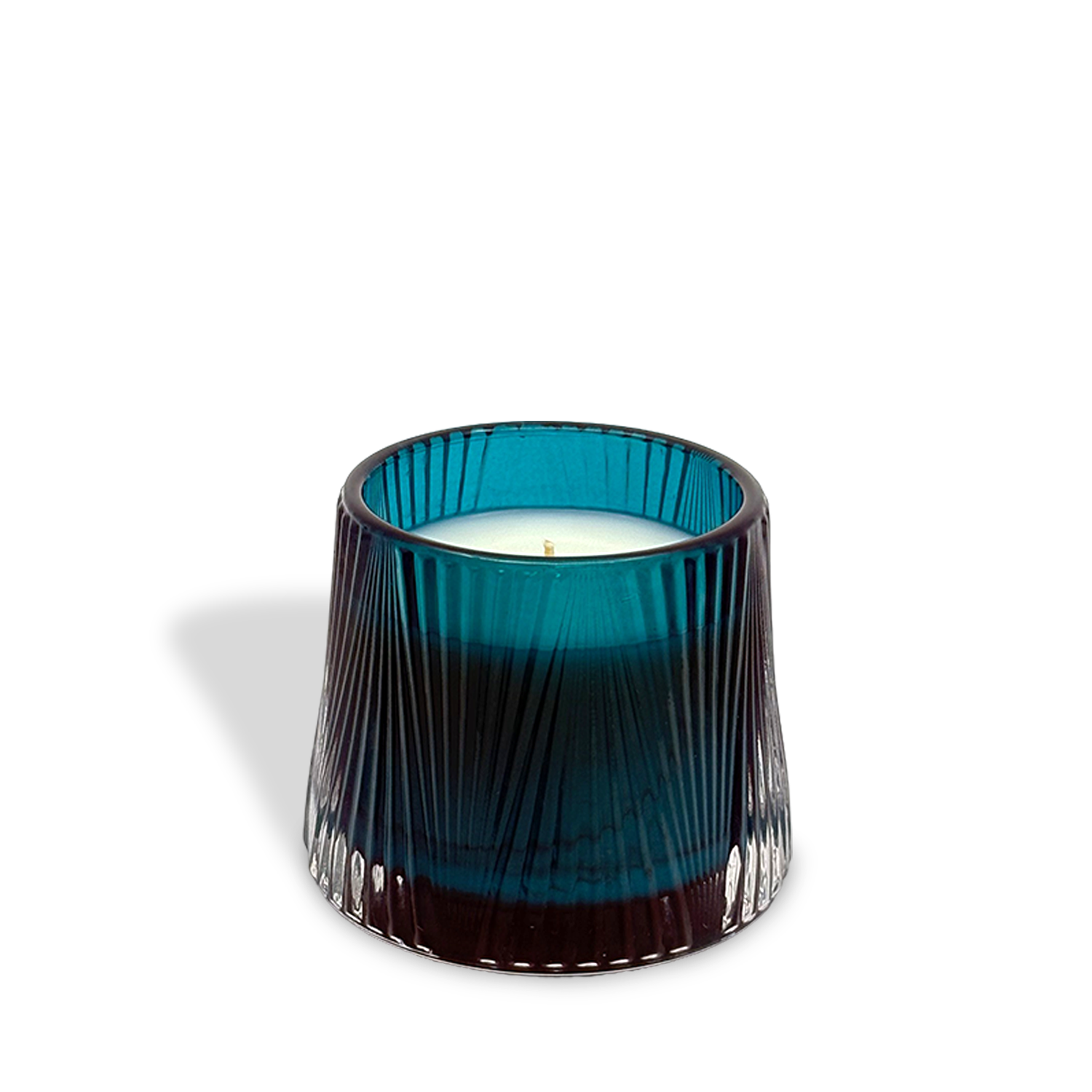 The est.1951 Midnight Iris & Verbena (4oz) features a blue and purple ribbed glass candle holder with a petite scented candle inside, displayed against a plain white background.