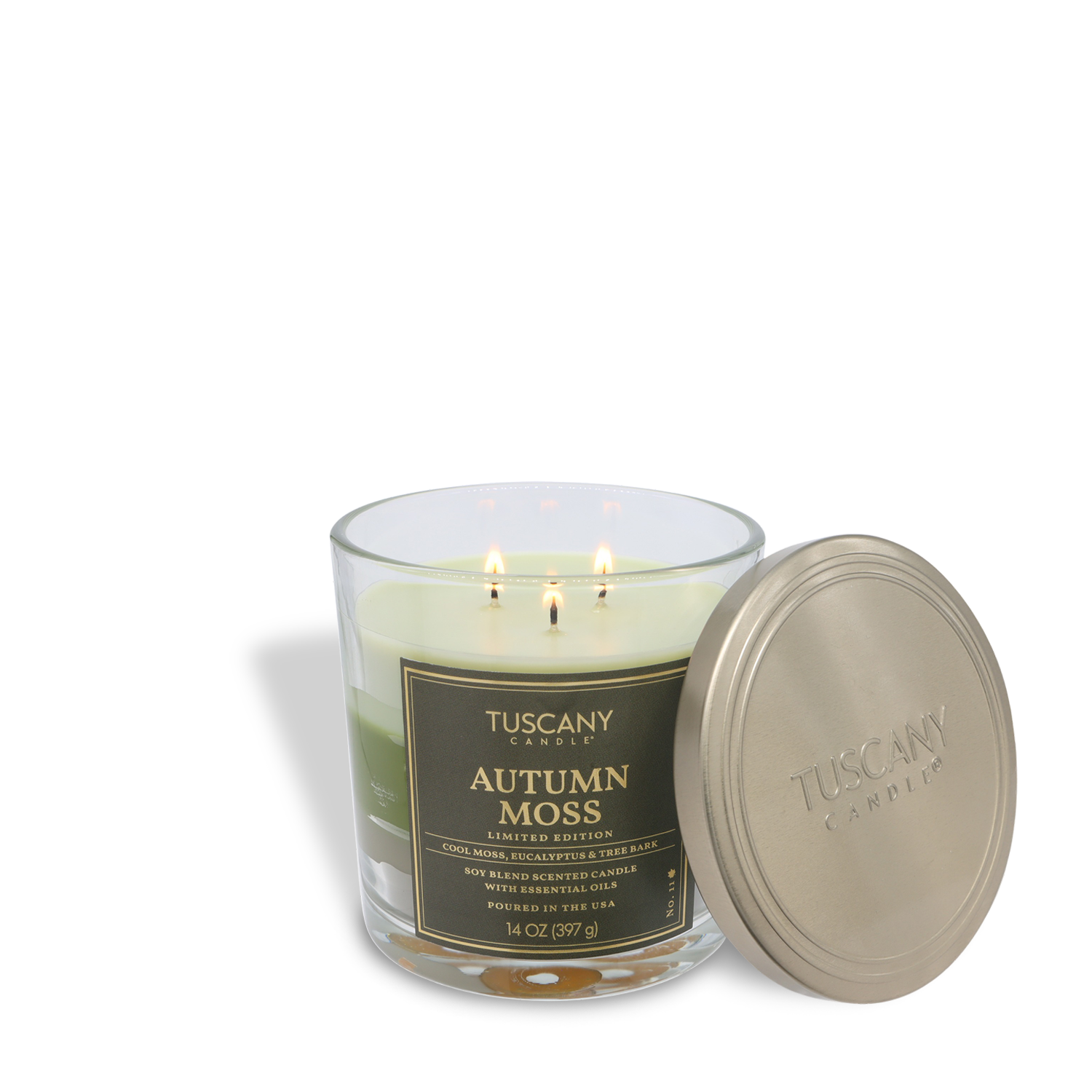 A 14 oz Tuscany Candle® SEASONAL "Autumn Moss: Eucalyptus & Sandalwood" 3-wick candle is displayed with its metallic lid beside it.