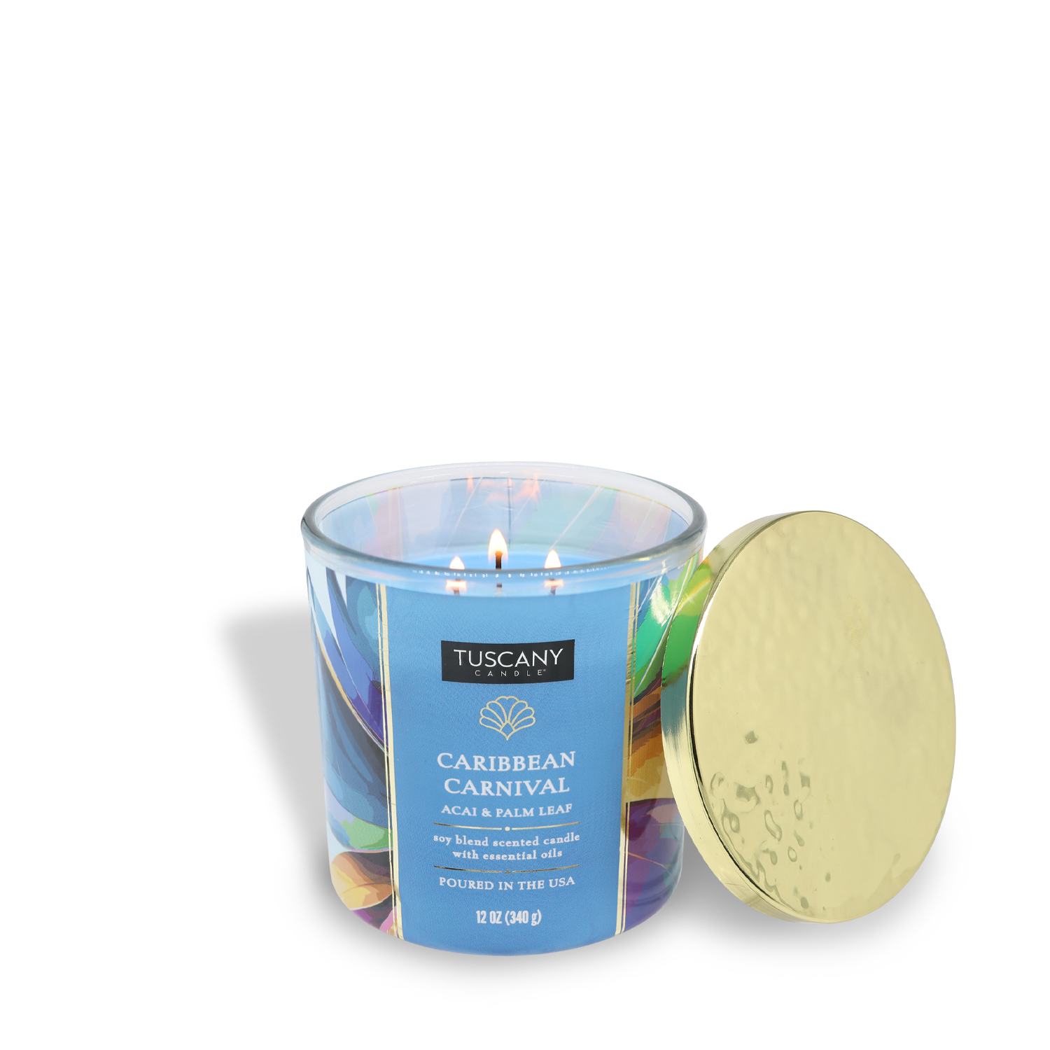 A Tuscany Candle® SEASONAL Caribbean Carnival: Passionfruit Scented Summer Candle (12 oz) from the Island Glam Collection comes in a glass jar with a gold lid, perfect for your summer décor.