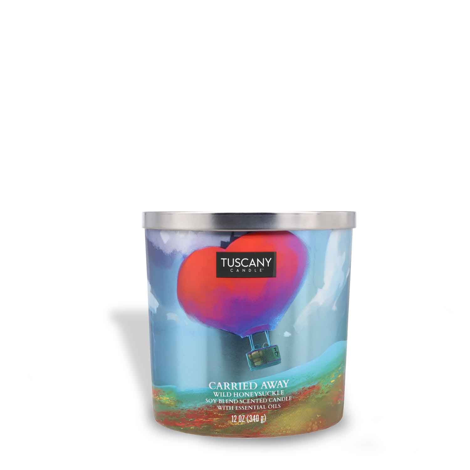 A dreamy Carried Away Scented Jar Candle (12 oz) from the Carried Away Collection with an image of a hot air balloon.