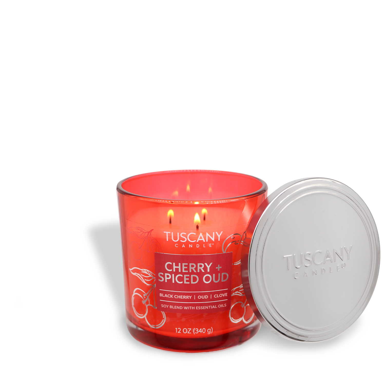 A red jar candle from the Tuscany Candle® EVD Painters' Palette Collection is labeled "Cherry + Spiced Oud: Black Cherry Scented Jar Candle (12 oz)" with an open lid beside it.