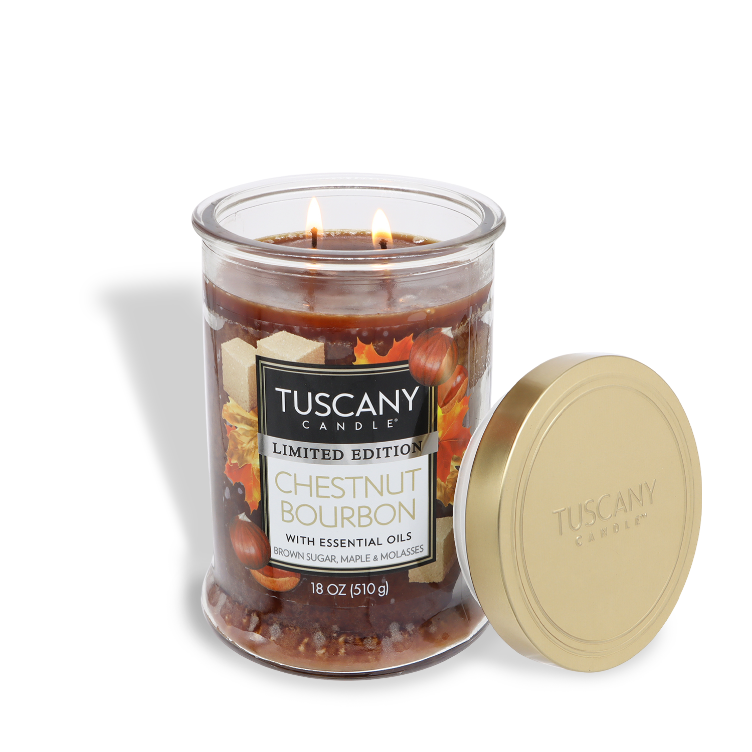 A Tuscany Candle® SEASONAL Chestnut Bourbon: Maple Syrup & Toasted Chestnut scented fall candle (18 oz) with two wicks and gold lid on the side; label notes brown sugar, maple, and molasses.