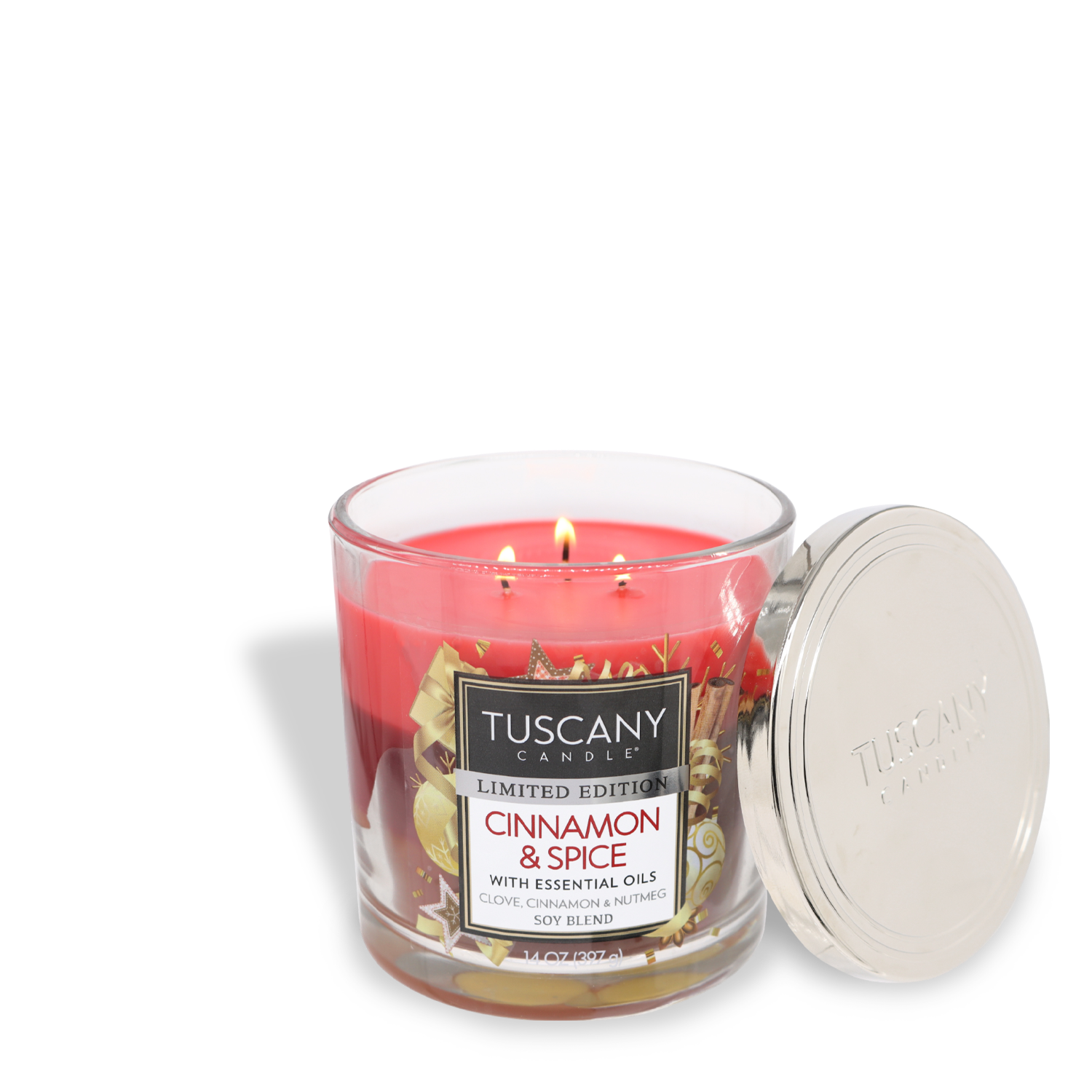 A lit Tuscany Candle® SEASONAL "Cinnamon & Spice Long-Lasting Scented Jar Candle (14 oz)" in a glass container with the lid placed beside it.