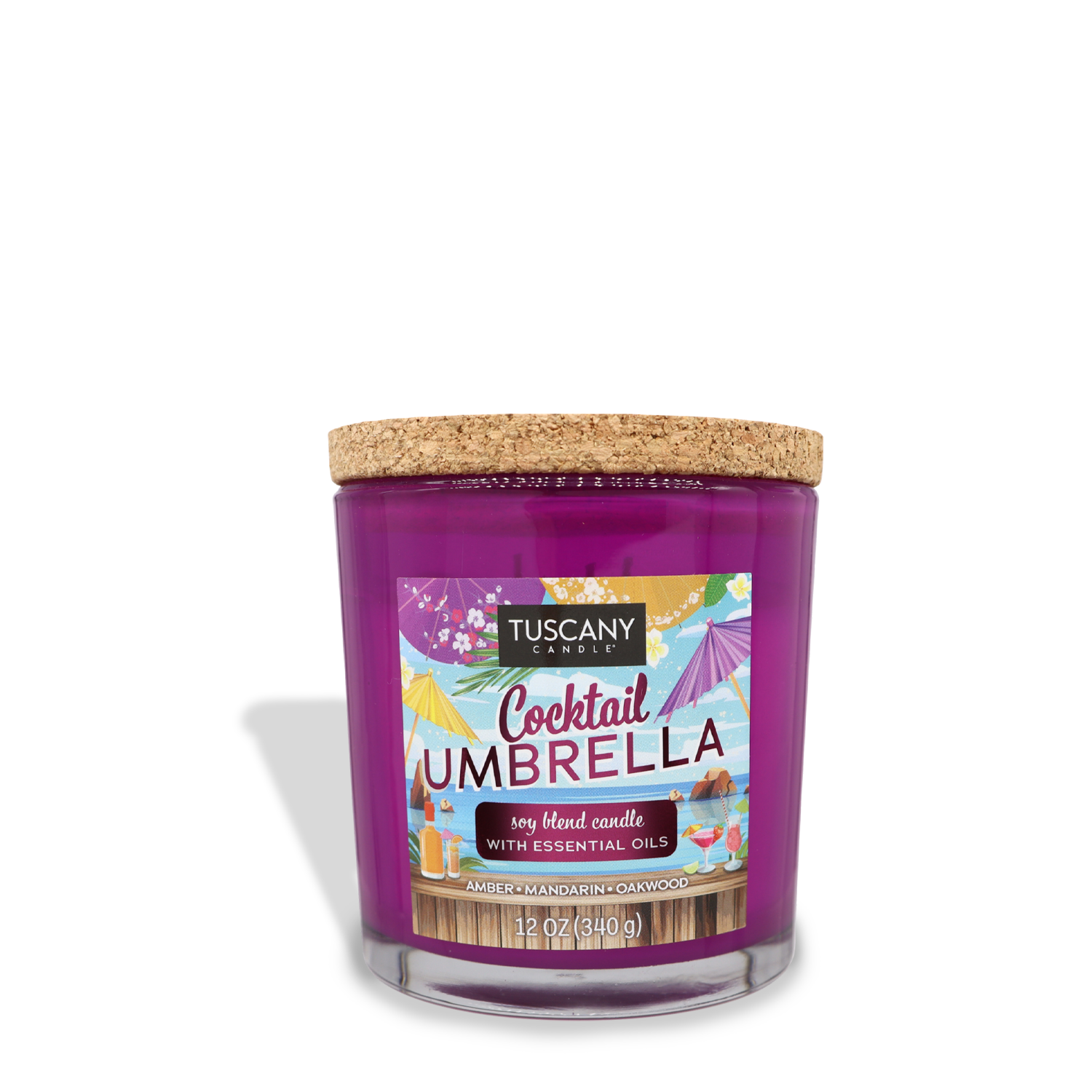 A purple Tuscany Candle® SEASONAL labeled "Cocktail Umbrella (12 oz) – Sunset Beach Bar Collection," a soy blend candle with essential oils, in an Amber Mandarin Oakwood scent. The candle has a cork lid and weighs 12 oz (340g).