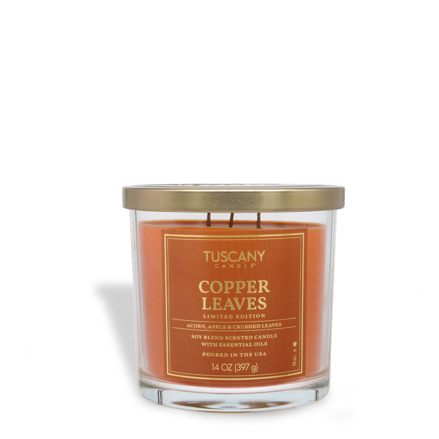 A 14 oz glass jar candle, Tuscany Candle® SEASONAL "Copper Leaves: Crisp Apple & Crushed Leaves," features orange wax, a gold lid, and soy blend fragrance—perfect for fall.