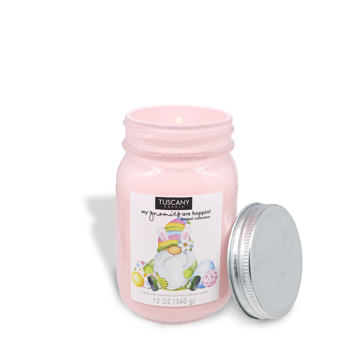 A fresh, floral pink jar of Gnome Bunny Breeze (12 oz) from the My Gnomies Are Hoppin' Collection, by Tuscany Candle® SEASONAL, with an image of an Easter bunny.