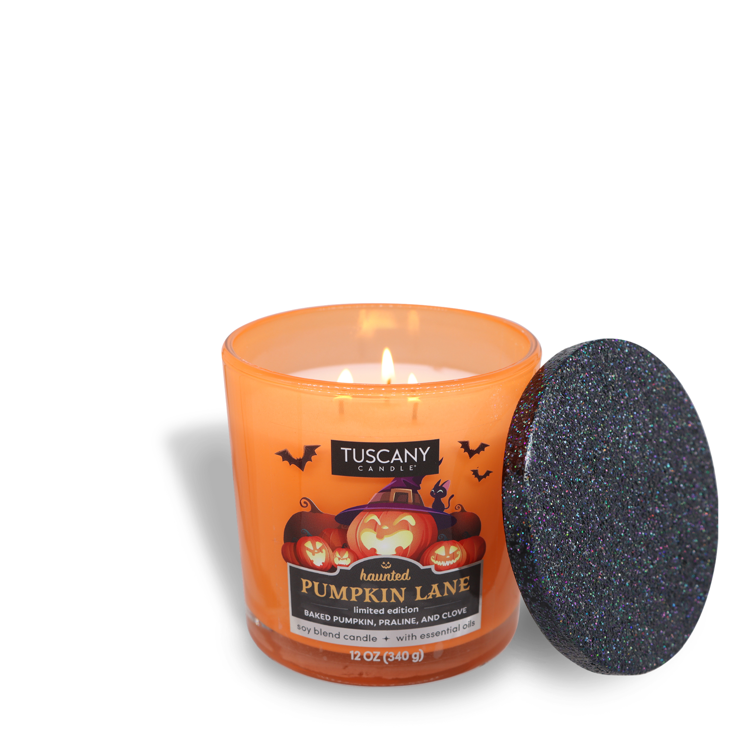 The orange candle in a glass jar labeled "Haunted Pumpkin Lane Long-Lasting Scented Jar Candle (12 oz)" by Tuscany Candle® SEASONAL, with lid removed and flame lit, features premium satin wax for a smooth and even burn.