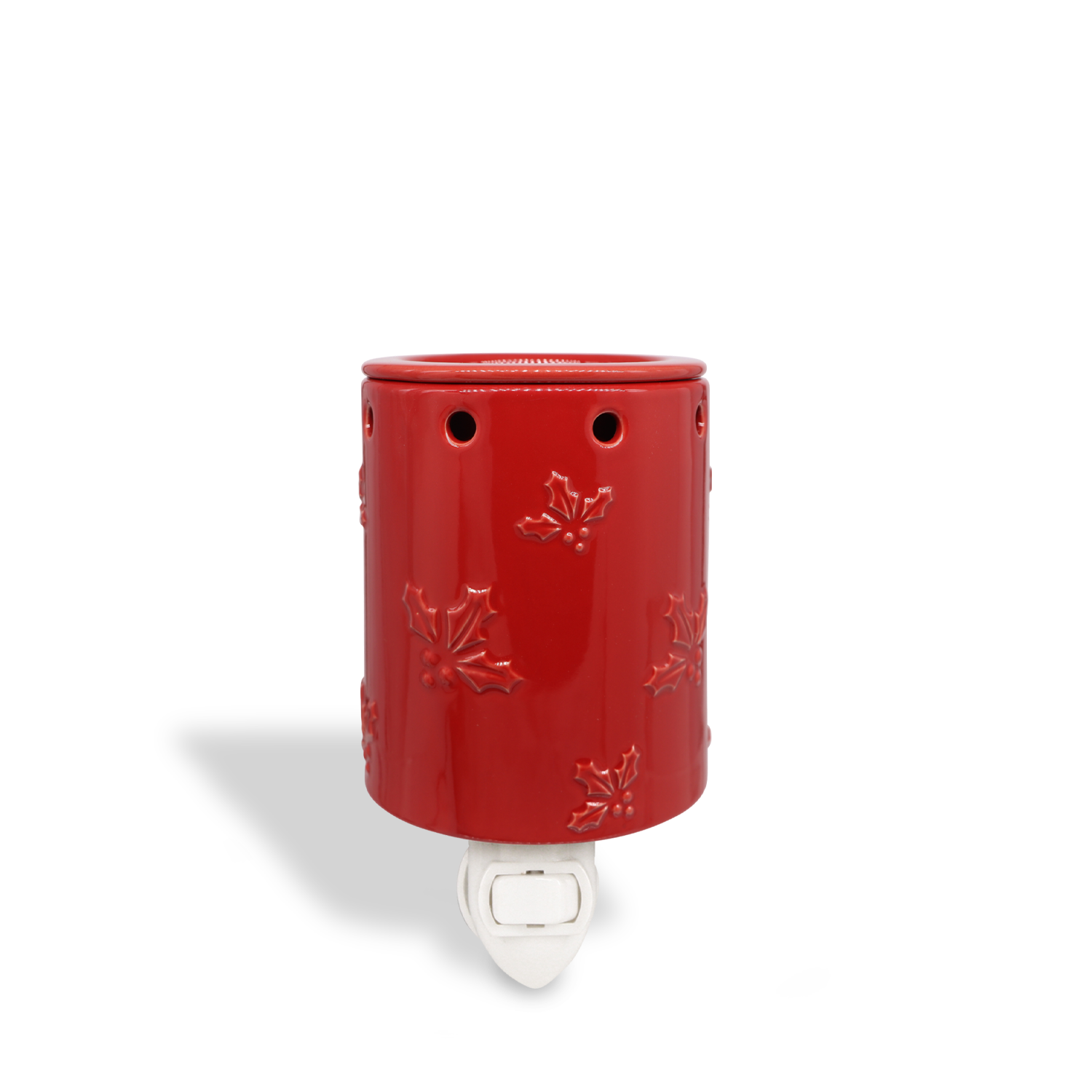 Holly Leaf Outlet Wax Melt Warmer by Tuscany Candle® SEASONAL, featuring red ceramic with embossed leaf designs on a white background.